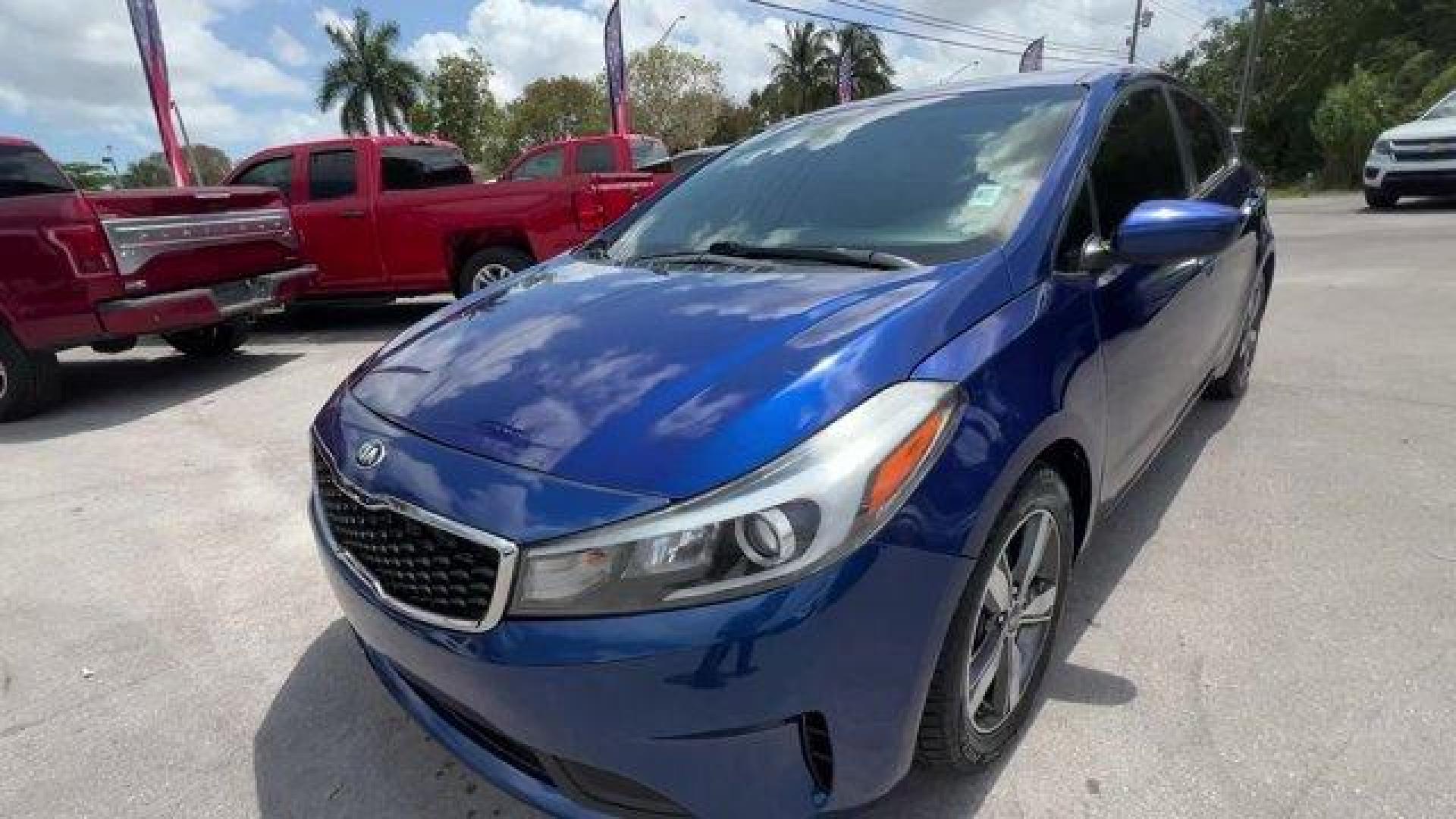 2018 Deep Sea Blue /Black Kia Forte LX (3KPFL4A73JE) with an 4 2.0 L engine, Automatic transmission, located at 27610 S Dixie Hwy, Homestead, FL, 33032, (305) 749-2348, 25.510241, -80.438301 - Delivers 37 Highway MPG and 29 City MPG! This Kia Forte delivers a Regular Unleaded I-4 2.0 L/122 engine powering this Automatic transmission. LX POPULAR PACKAGE -inc: covered console w/dual 12v outlet and drive mode select, Auto-On/Off Headlights, Dual Illuminated Visor Vanity Mirrors, Front Passen - Photo#0