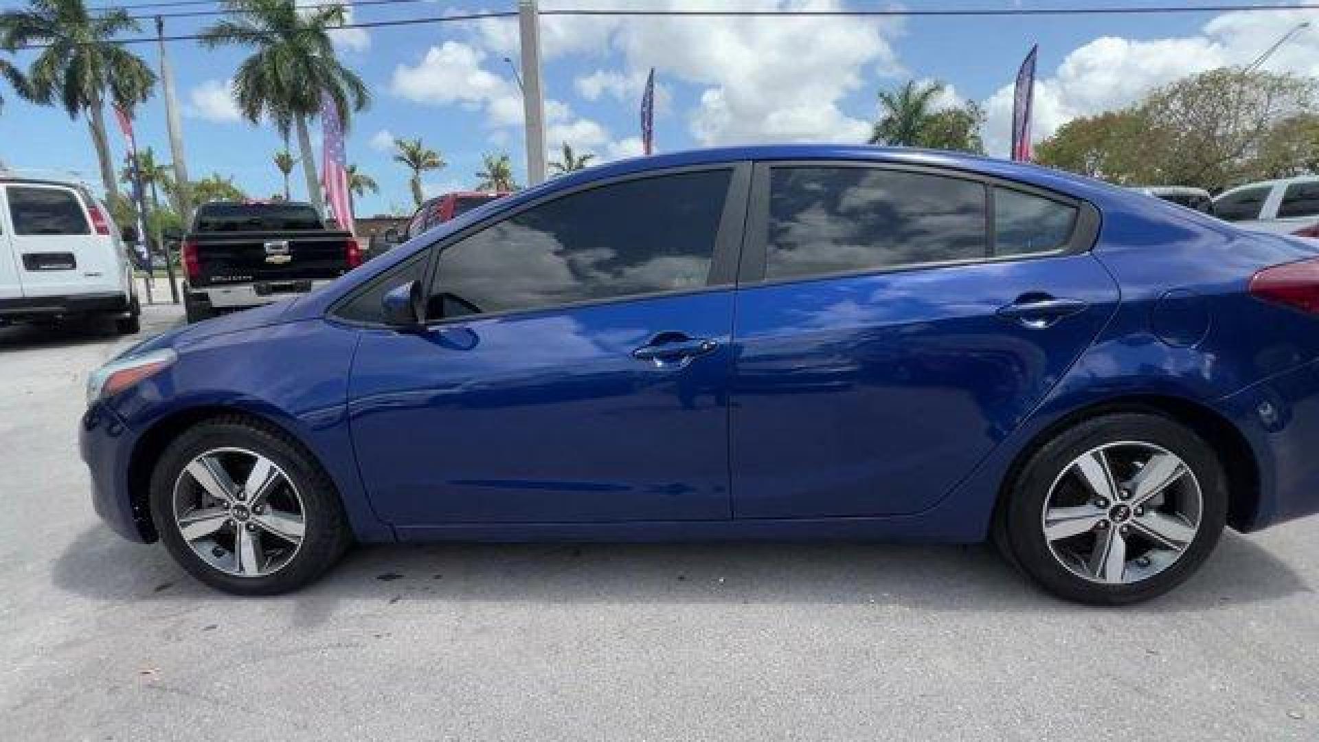2018 Deep Sea Blue /Black Kia Forte LX (3KPFL4A73JE) with an 4 2.0 L engine, Automatic transmission, located at 27610 S Dixie Hwy, Homestead, FL, 33032, (305) 749-2348, 25.510241, -80.438301 - Delivers 37 Highway MPG and 29 City MPG! This Kia Forte delivers a Regular Unleaded I-4 2.0 L/122 engine powering this Automatic transmission. LX POPULAR PACKAGE -inc: covered console w/dual 12v outlet and drive mode select, Auto-On/Off Headlights, Dual Illuminated Visor Vanity Mirrors, Front Passen - Photo#1