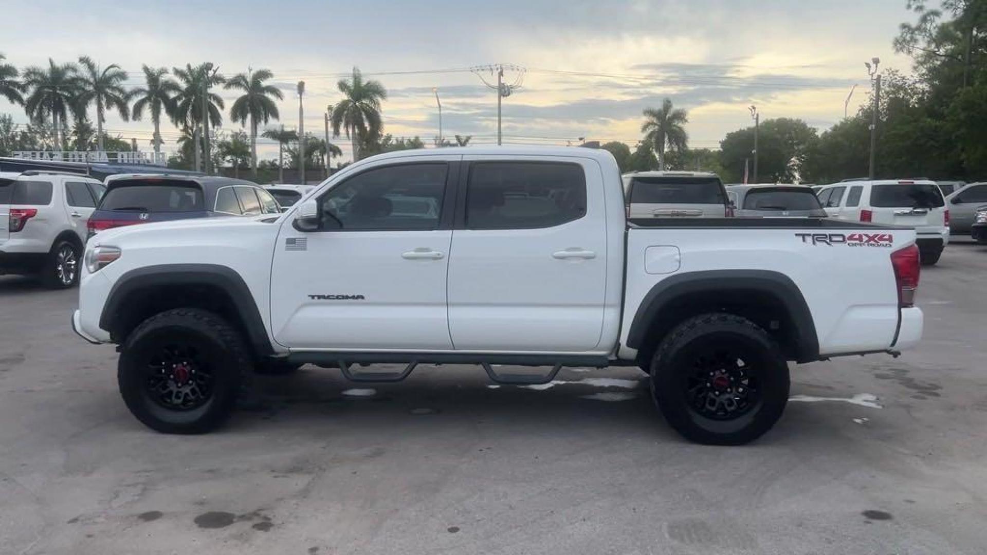 2016 Super White /Graphite Toyota Tacoma SR5 (5TFCZ5AN2GX) with an V6 engine, Automatic transmission, located at 27610 S Dixie Hwy, Homestead, FL, 33032, (305) 749-2348, 25.510241, -80.438301 - Photo#1