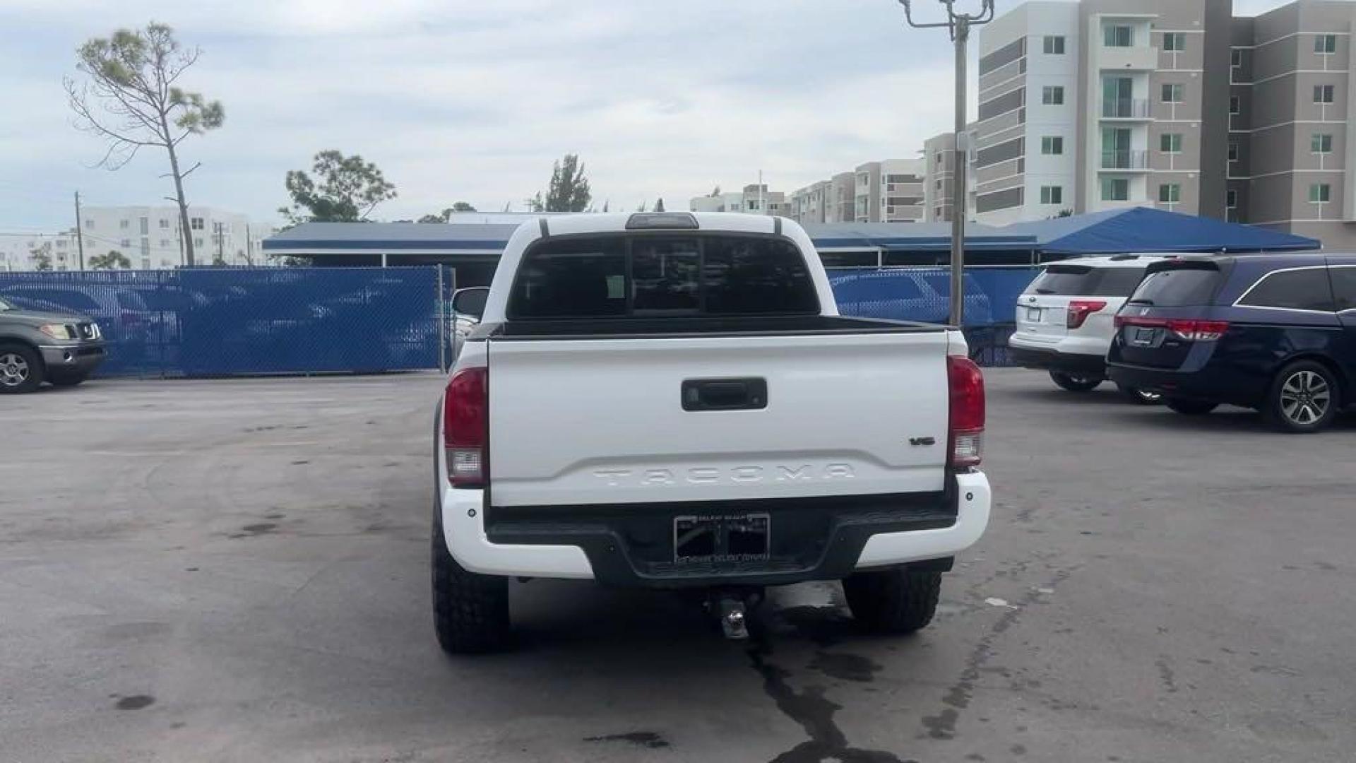 2016 Super White /Graphite Toyota Tacoma SR5 (5TFCZ5AN2GX) with an V6 engine, Automatic transmission, located at 27610 S Dixie Hwy, Homestead, FL, 33032, (305) 749-2348, 25.510241, -80.438301 - Photo#3