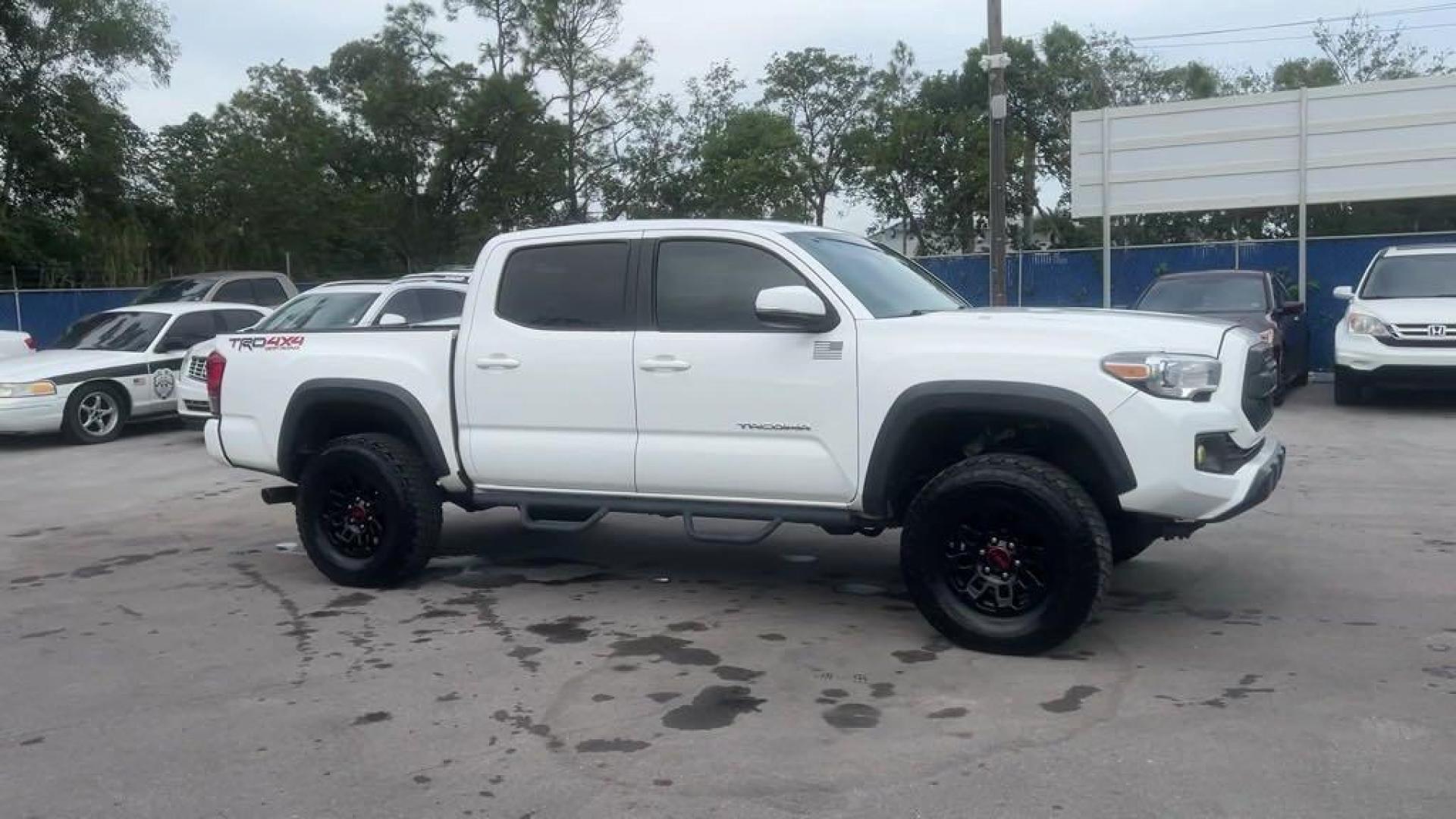 2016 Super White /Graphite Toyota Tacoma SR5 (5TFCZ5AN2GX) with an V6 engine, Automatic transmission, located at 27610 S Dixie Hwy, Homestead, FL, 33032, (305) 749-2348, 25.510241, -80.438301 - Photo#5