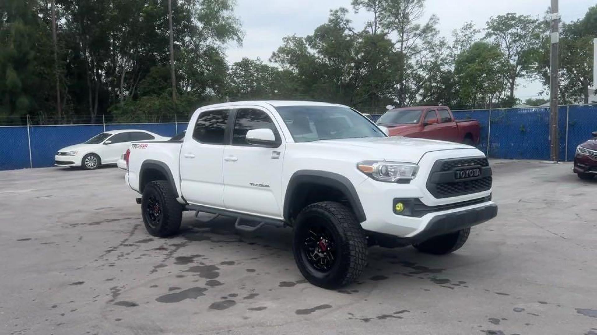 2016 Super White /Graphite Toyota Tacoma SR5 (5TFCZ5AN2GX) with an V6 engine, Automatic transmission, located at 27610 S Dixie Hwy, Homestead, FL, 33032, (305) 749-2348, 25.510241, -80.438301 - Photo#6