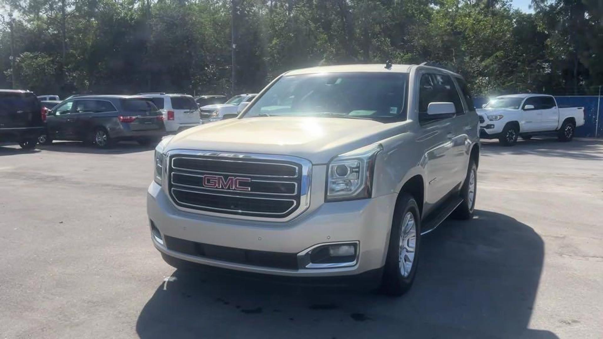 2015 Champagne Silver Metallic /Jet Black GMC Yukon SLE (1GKS1AKC6FR) with an EcoTec3 5.3L V8 engine, Automatic transmission, located at 27610 S Dixie Hwy, Homestead, FL, 33032, (305) 749-2348, 25.510241, -80.438301 - Photo#0