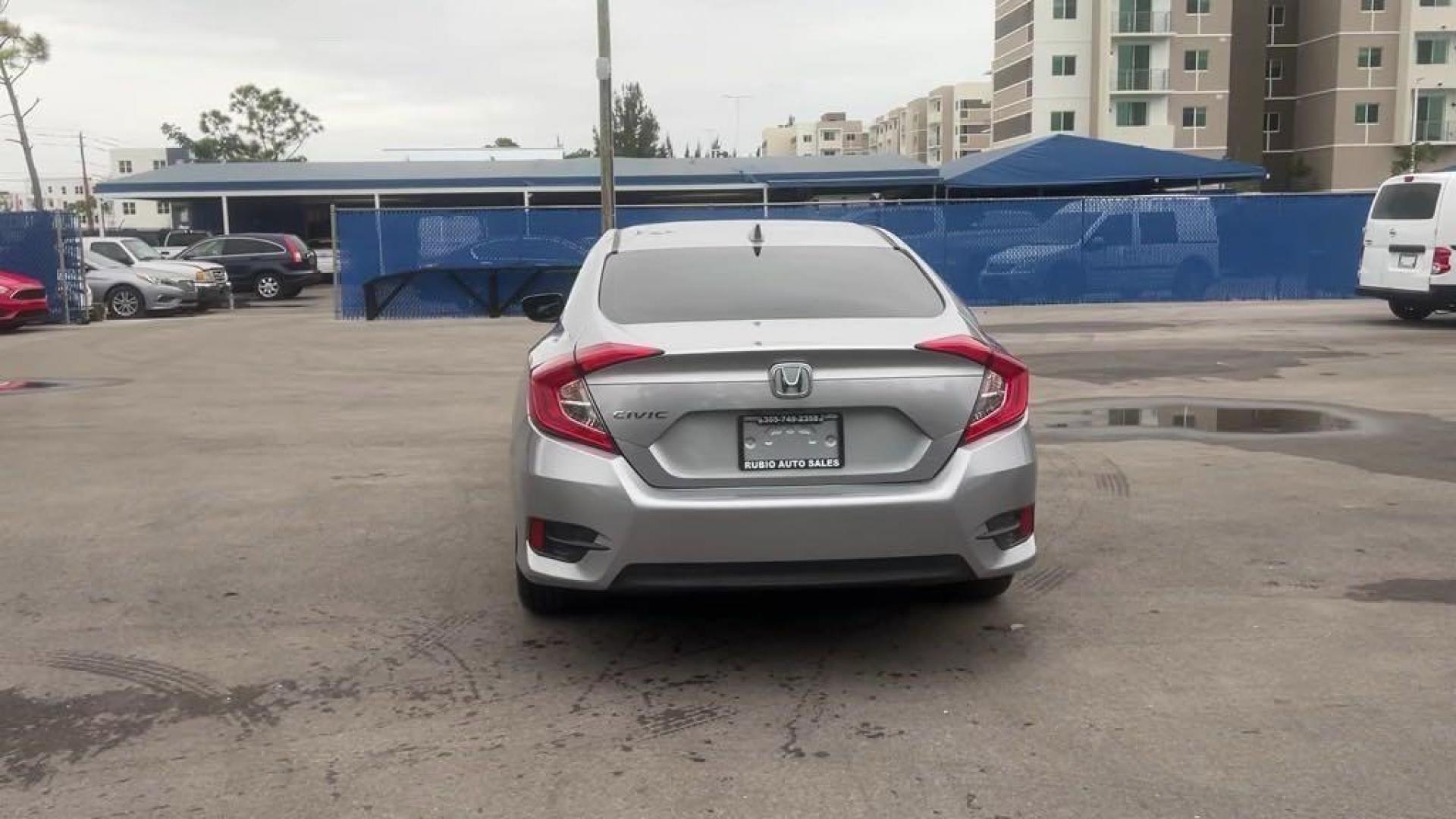 2018 Lunar Silver Metallic /Black Honda Civic EX (19XFC2F72JE) with an 2.0L I4 DOHC 16V i-VTEC engine, CVT transmission, located at 27610 S Dixie Hwy, Homestead, FL, 33032, (305) 749-2348, 25.510241, -80.438301 - Photo#3