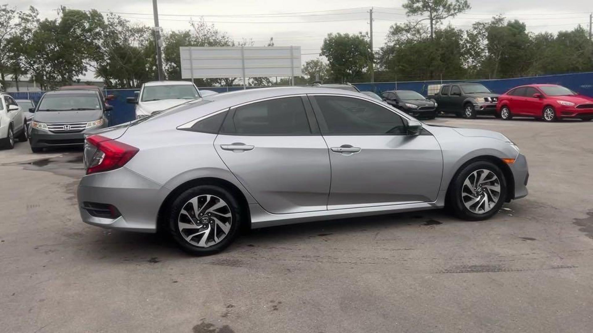 2018 Lunar Silver Metallic /Black Honda Civic EX (19XFC2F72JE) with an 2.0L I4 DOHC 16V i-VTEC engine, CVT transmission, located at 27610 S Dixie Hwy, Homestead, FL, 33032, (305) 749-2348, 25.510241, -80.438301 - Photo#5