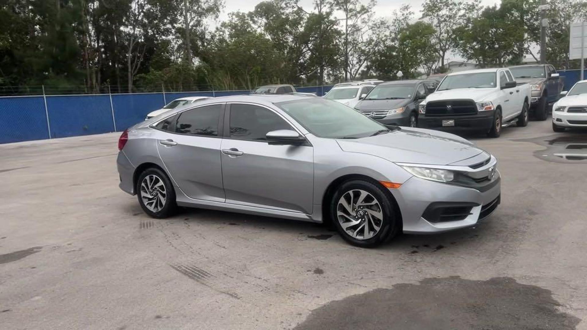 2018 Lunar Silver Metallic /Black Honda Civic EX (19XFC2F72JE) with an 2.0L I4 DOHC 16V i-VTEC engine, CVT transmission, located at 27610 S Dixie Hwy, Homestead, FL, 33032, (305) 749-2348, 25.510241, -80.438301 - Photo#6