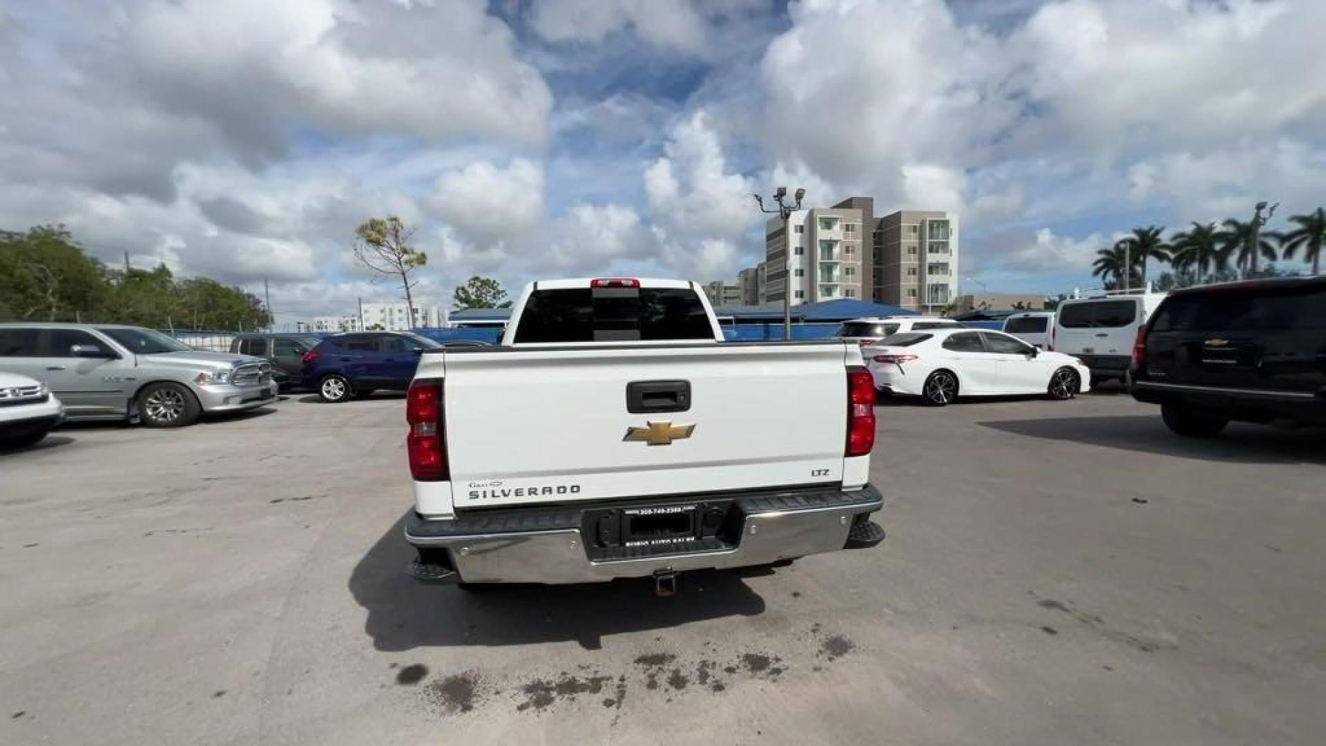 2015 Summit White /Jet Black Chevrolet Silverado 1500 LTZ (1GCVKSECXFZ) with an EcoTec3 5.3L V8 engine, Automatic transmission, located at 27610 S Dixie Hwy, Homestead, FL, 33032, (305) 749-2348, 25.510241, -80.438301 - Photo#3