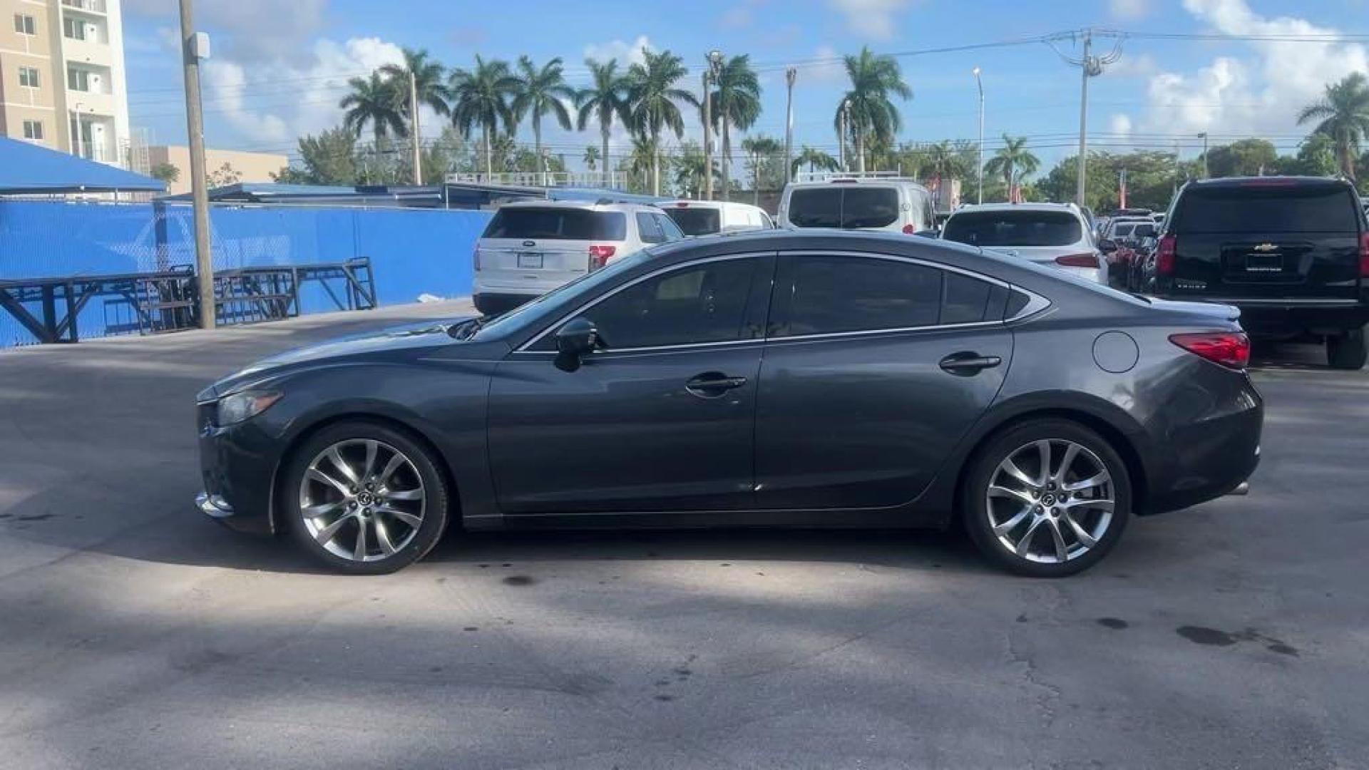 2014 Meteor Gray Mica Mazda Mazda6 i Grand Touring (JM1GJ1W55E1) with an SKYACTIV-G 2.5L I4 DOHC 16V engine, Automatic transmission, located at 27610 S Dixie Hwy, Homestead, FL, 33032, (305) 749-2348, 25.510241, -80.438301 - Photo#1