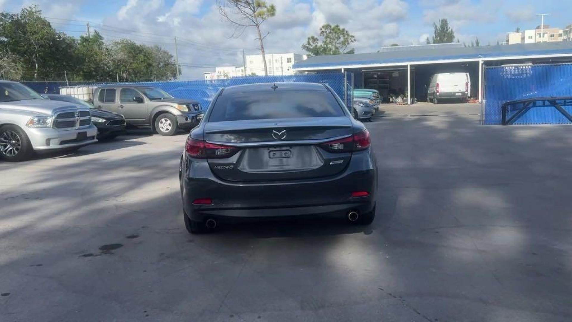 2014 Meteor Gray Mica Mazda Mazda6 i Grand Touring (JM1GJ1W55E1) with an SKYACTIV-G 2.5L I4 DOHC 16V engine, Automatic transmission, located at 27610 S Dixie Hwy, Homestead, FL, 33032, (305) 749-2348, 25.510241, -80.438301 - Photo#3