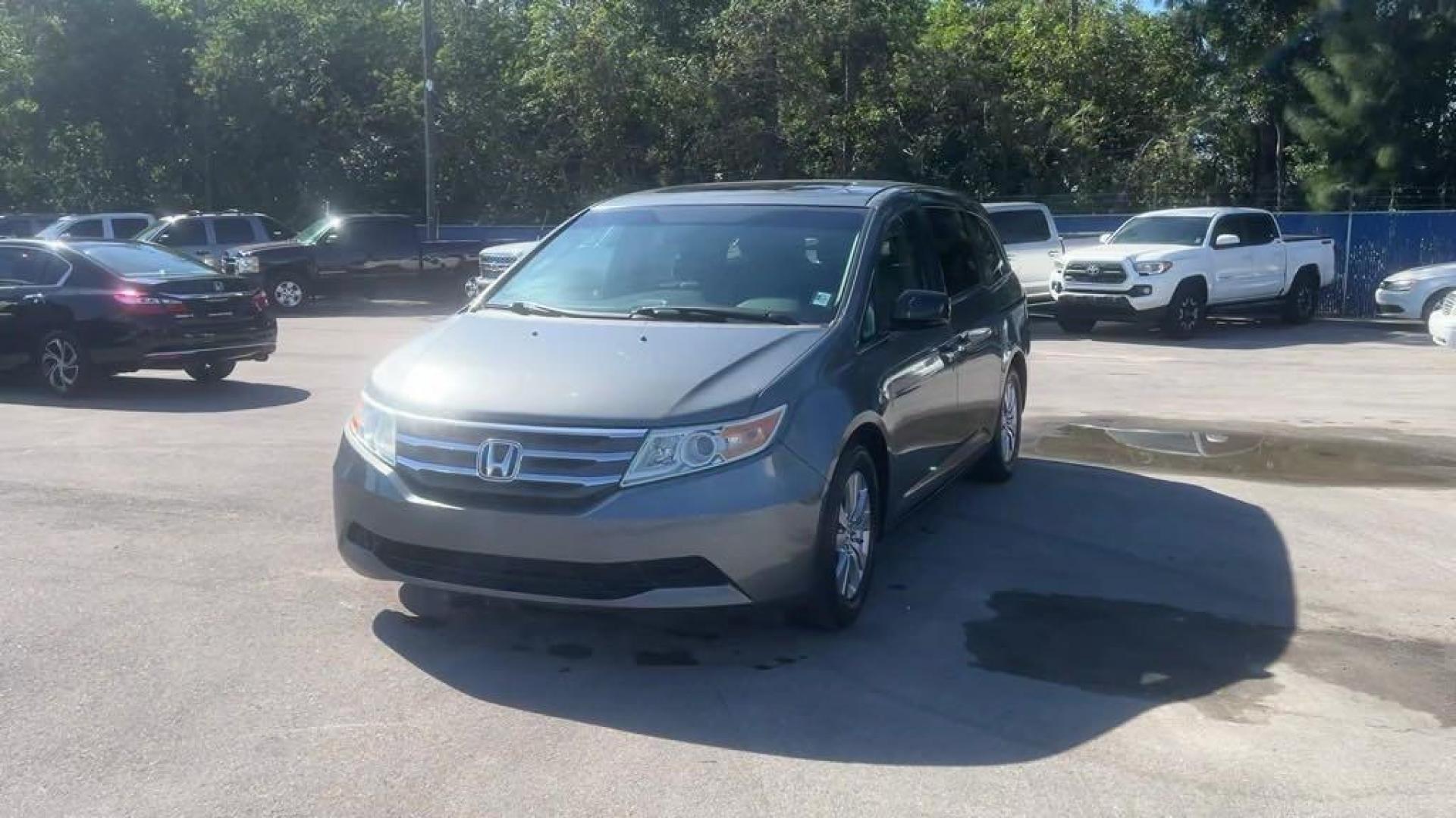 2011 Polished Metal Metallic /Gray Honda Odyssey EX-L (5FNRL5H66BB) with an 3.5L V6 engine, Automatic transmission, located at 27610 S Dixie Hwy, Homestead, FL, 33032, (305) 749-2348, 25.510241, -80.438301 - Photo#0