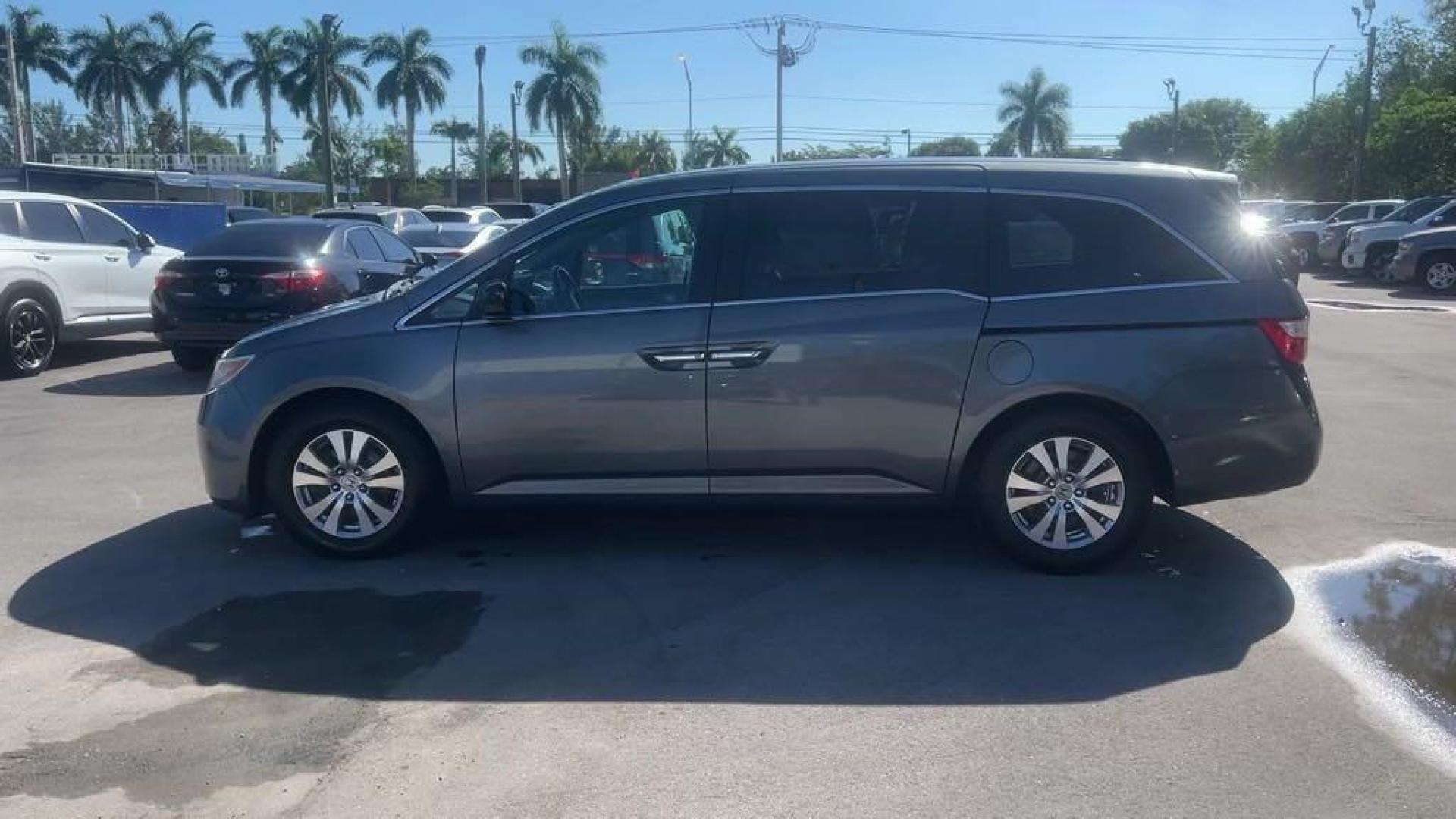 2011 Polished Metal Metallic /Gray Honda Odyssey EX-L (5FNRL5H66BB) with an 3.5L V6 engine, Automatic transmission, located at 27610 S Dixie Hwy, Homestead, FL, 33032, (305) 749-2348, 25.510241, -80.438301 - Photo#1