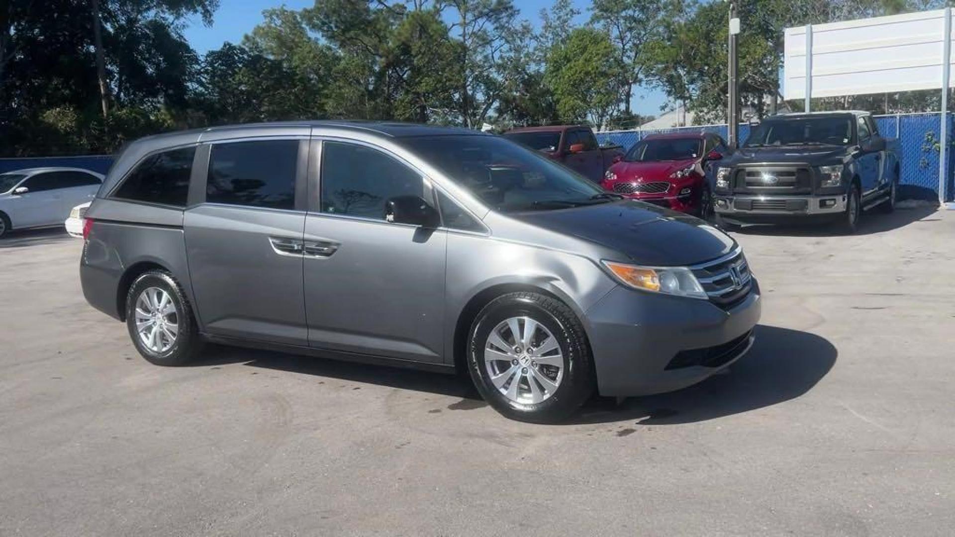 2011 Polished Metal Metallic /Gray Honda Odyssey EX-L (5FNRL5H66BB) with an 3.5L V6 engine, Automatic transmission, located at 27610 S Dixie Hwy, Homestead, FL, 33032, (305) 749-2348, 25.510241, -80.438301 - Photo#6
