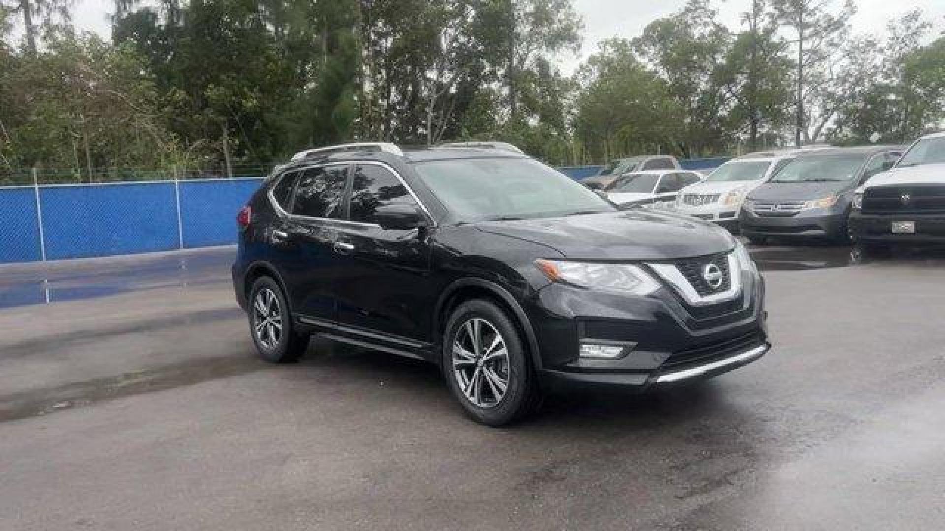 2017 Magnetic Black /Charcoal Nissan Rogue SL (JN8AT2MT3HW) with an 4 2.5 L engine, Variable transmission, located at 27610 S Dixie Hwy, Homestead, FL, 33032, (305) 749-2348, 25.510241, -80.438301 - IIHS Top Safety Pick+. Only 60,014 Miles! Boasts 33 Highway MPG and 26 City MPG! This Nissan Rogue boasts a Regular Unleaded I-4 2.5 L/152 engine powering this Variable transmission. MAGNETIC BLACK, CHARCOAL, LEATHER APPOINTED SEAT TRIM, [Z66] ACTIVATION DISCLAIMER.*This Nissan Rogue Comes Equipped - Photo#0