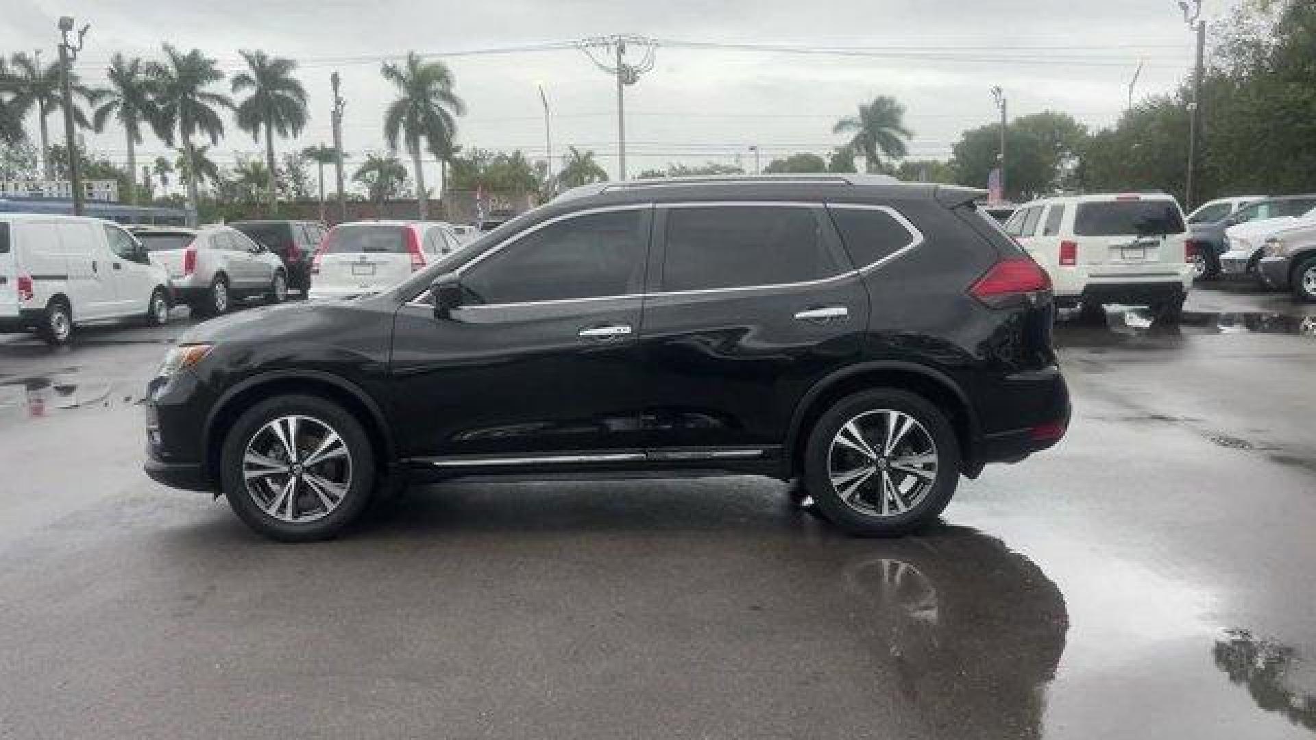 2017 Magnetic Black /Charcoal Nissan Rogue SL (JN8AT2MT3HW) with an 4 2.5 L engine, Variable transmission, located at 27610 S Dixie Hwy, Homestead, FL, 33032, (305) 749-2348, 25.510241, -80.438301 - IIHS Top Safety Pick+. Only 60,014 Miles! Boasts 33 Highway MPG and 26 City MPG! This Nissan Rogue boasts a Regular Unleaded I-4 2.5 L/152 engine powering this Variable transmission. MAGNETIC BLACK, CHARCOAL, LEATHER APPOINTED SEAT TRIM, [Z66] ACTIVATION DISCLAIMER.*This Nissan Rogue Comes Equipped - Photo#2