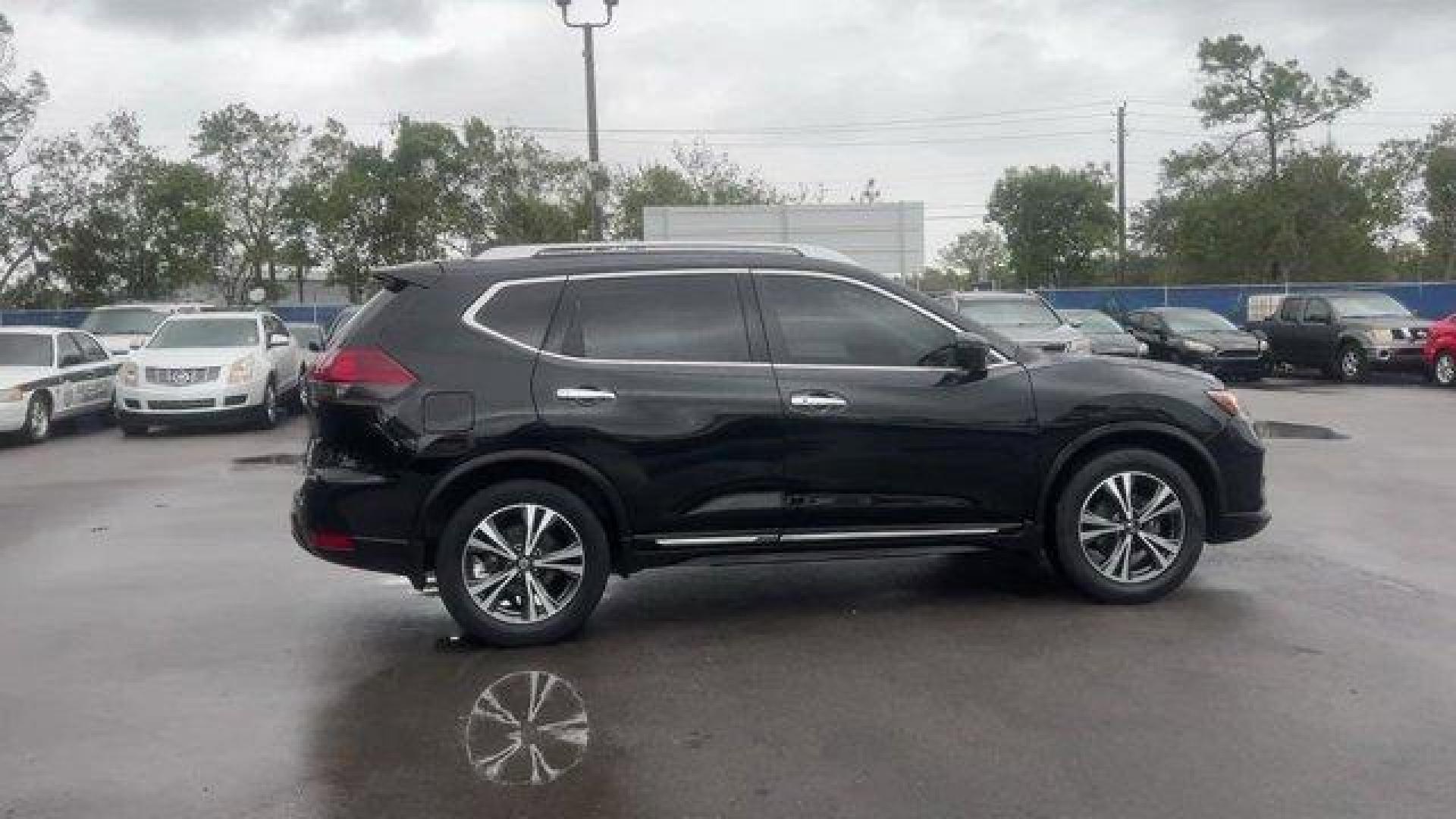 2017 Magnetic Black /Charcoal Nissan Rogue SL (JN8AT2MT3HW) with an 4 2.5 L engine, Variable transmission, located at 27610 S Dixie Hwy, Homestead, FL, 33032, (305) 749-2348, 25.510241, -80.438301 - IIHS Top Safety Pick+. Only 60,014 Miles! Boasts 33 Highway MPG and 26 City MPG! This Nissan Rogue boasts a Regular Unleaded I-4 2.5 L/152 engine powering this Variable transmission. MAGNETIC BLACK, CHARCOAL, LEATHER APPOINTED SEAT TRIM, [Z66] ACTIVATION DISCLAIMER.*This Nissan Rogue Comes Equipped - Photo#9