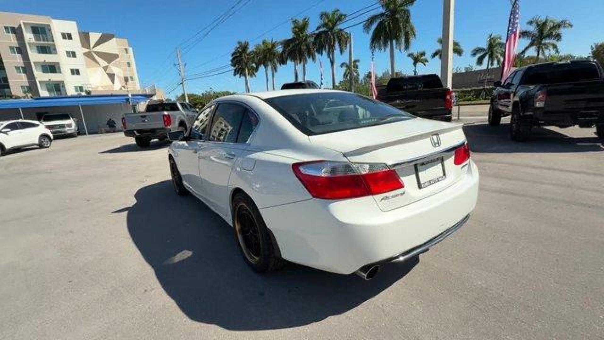 2013 White Honda Accord Sdn Sport (1HGCR2F51DA) with an 4 2.4L engine, Variable transmission, located at 27610 S Dixie Hwy, Homestead, FL, 33032, (305) 749-2348, 25.510241, -80.438301 - IIHS Top Safety Pick. Delivers 35 Highway MPG and 26 City MPG! This Honda Accord Sdn boasts a Gas I4 2.4L/144 engine powering this Variable transmission. Vehicle Stability Assist (VSA) w/traction control, Variable intermittent flush windshield wipers, Tire pressure monitoring system.*This Honda Acco - Photo#2