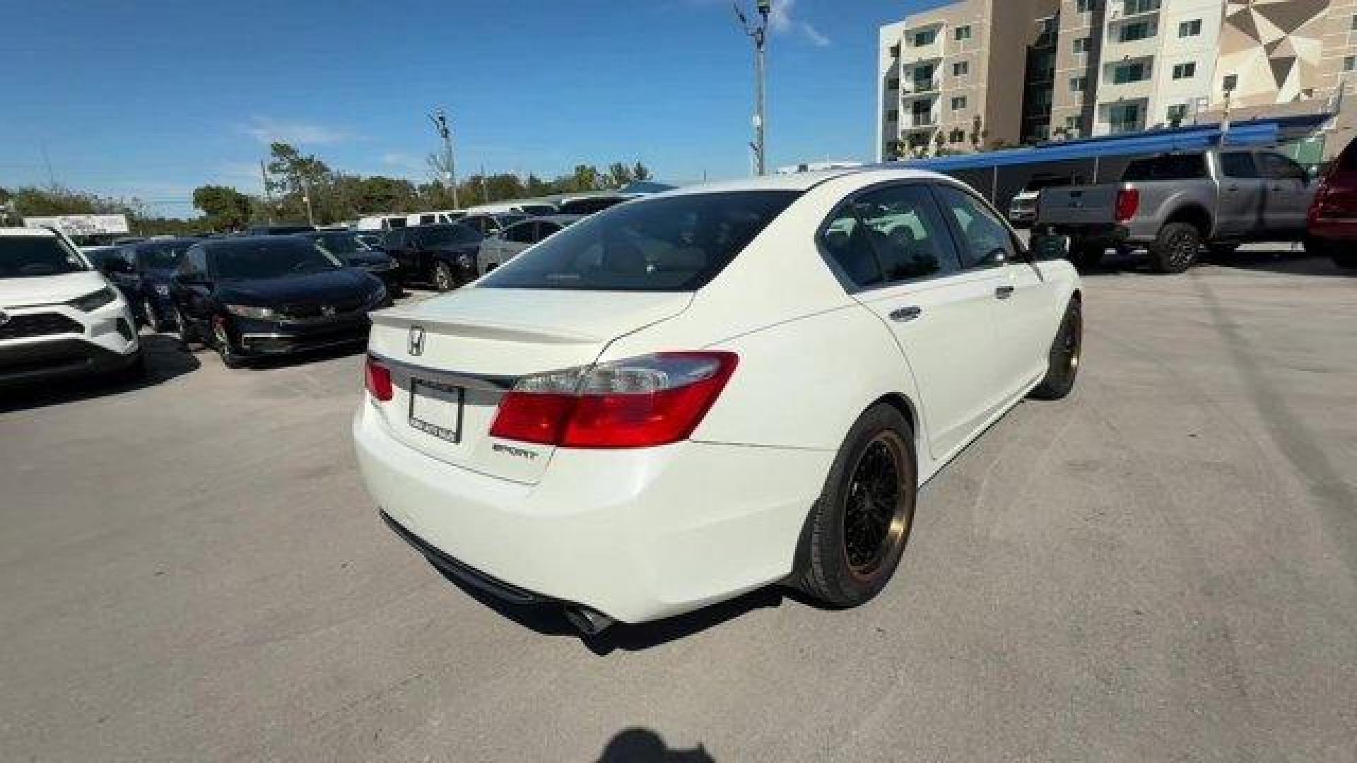 2013 White Honda Accord Sdn Sport (1HGCR2F51DA) with an 4 2.4L engine, Variable transmission, located at 27610 S Dixie Hwy, Homestead, FL, 33032, (305) 749-2348, 25.510241, -80.438301 - IIHS Top Safety Pick. Delivers 35 Highway MPG and 26 City MPG! This Honda Accord Sdn boasts a Gas I4 2.4L/144 engine powering this Variable transmission. Vehicle Stability Assist (VSA) w/traction control, Variable intermittent flush windshield wipers, Tire pressure monitoring system.*This Honda Acco - Photo#4