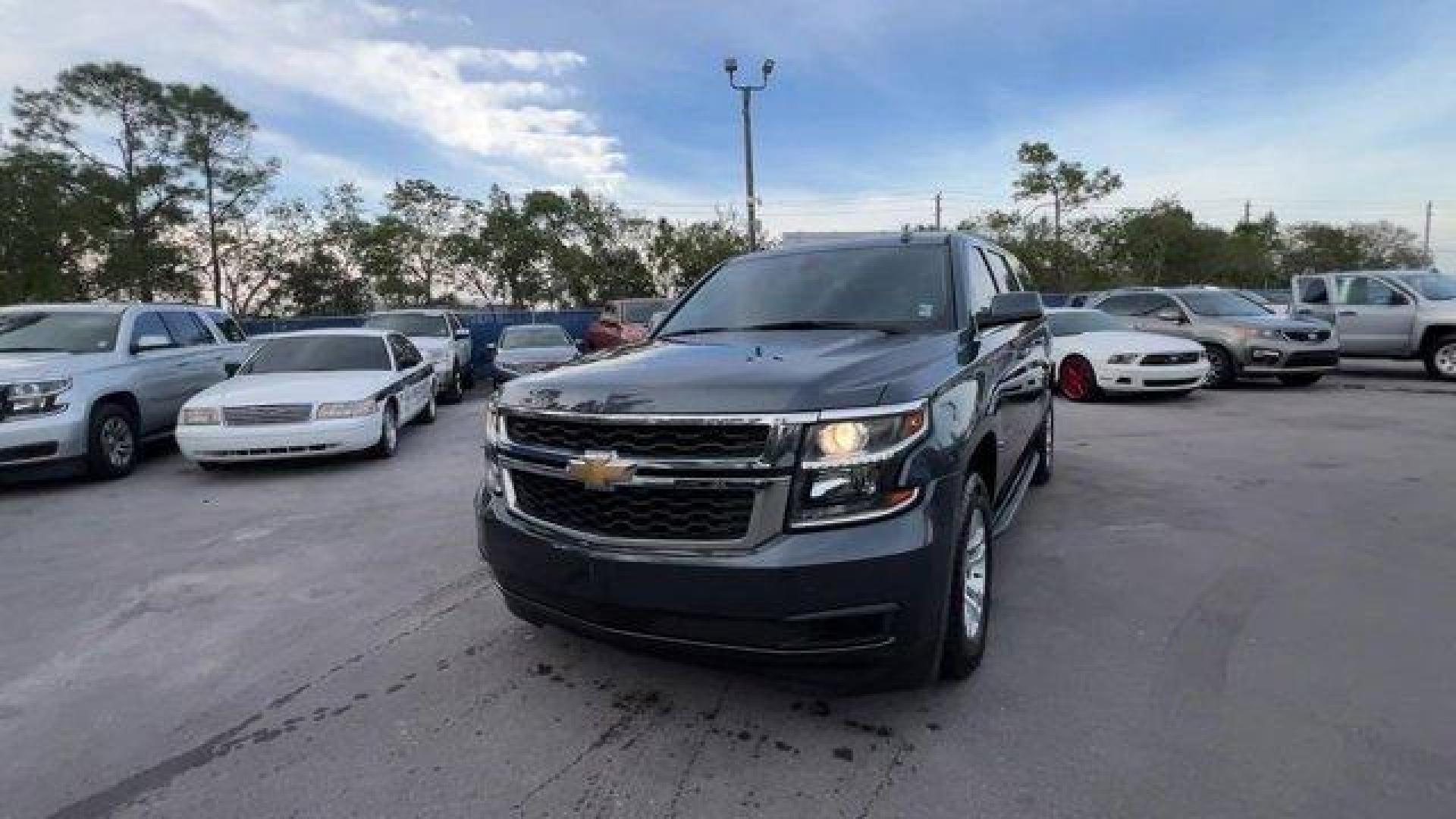 2020 Shadow Gray Metallic /Jet Black Chevrolet Suburban LS (1GNSCGKC9LR) with an 8 5.3L engine, Automatic transmission, located at 27610 S Dixie Hwy, Homestead, FL, 33032, (305) 749-2348, 25.510241, -80.438301 - Only 42,562 Miles! Boasts 22 Highway MPG and 15 City MPG! This Chevrolet Suburban boasts a Gas/Ethanol V8 5.3L/ engine powering this Automatic transmission. WHEELS, 18 X 8.5 (45.7 CM X 21.6 CM) ALUMINUM WITH HIGH-POLISHED FINISH (STD), TRANSMISSION, 6-SPEED AUTOMATIC, ELECTRONICALLY CONTROLLED with - Photo#0