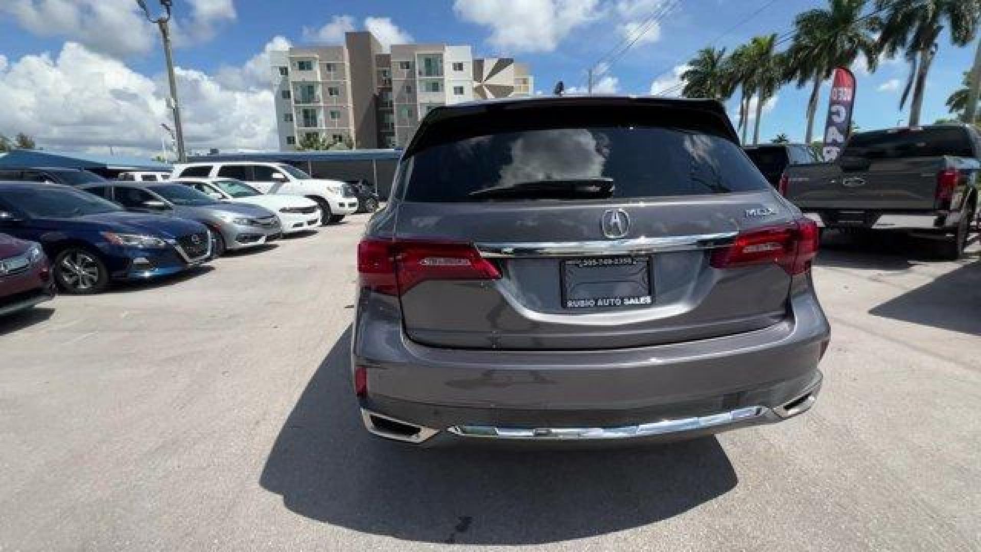 2020 Gray Acura MDX Technology (5J8YD3H52LL) with an 6 3.5 L engine, Automatic transmission, located at 27610 S Dixie Hwy, Homestead, FL, 33032, (305) 749-2348, 25.510241, -80.438301 - Only 23,617 Miles! Delivers 27 Highway MPG and 20 City MPG! This Acura MDX boasts a Premium Unleaded V-6 3.5 L/212 engine powering this Automatic transmission. Window Grid Antenna, Wheels: 20 x 8 Shark Gray Twisted 10-Spoke -inc: Machine-finished, Voice Activated Multi Zone Auto-Climate Control Air - Photo#2