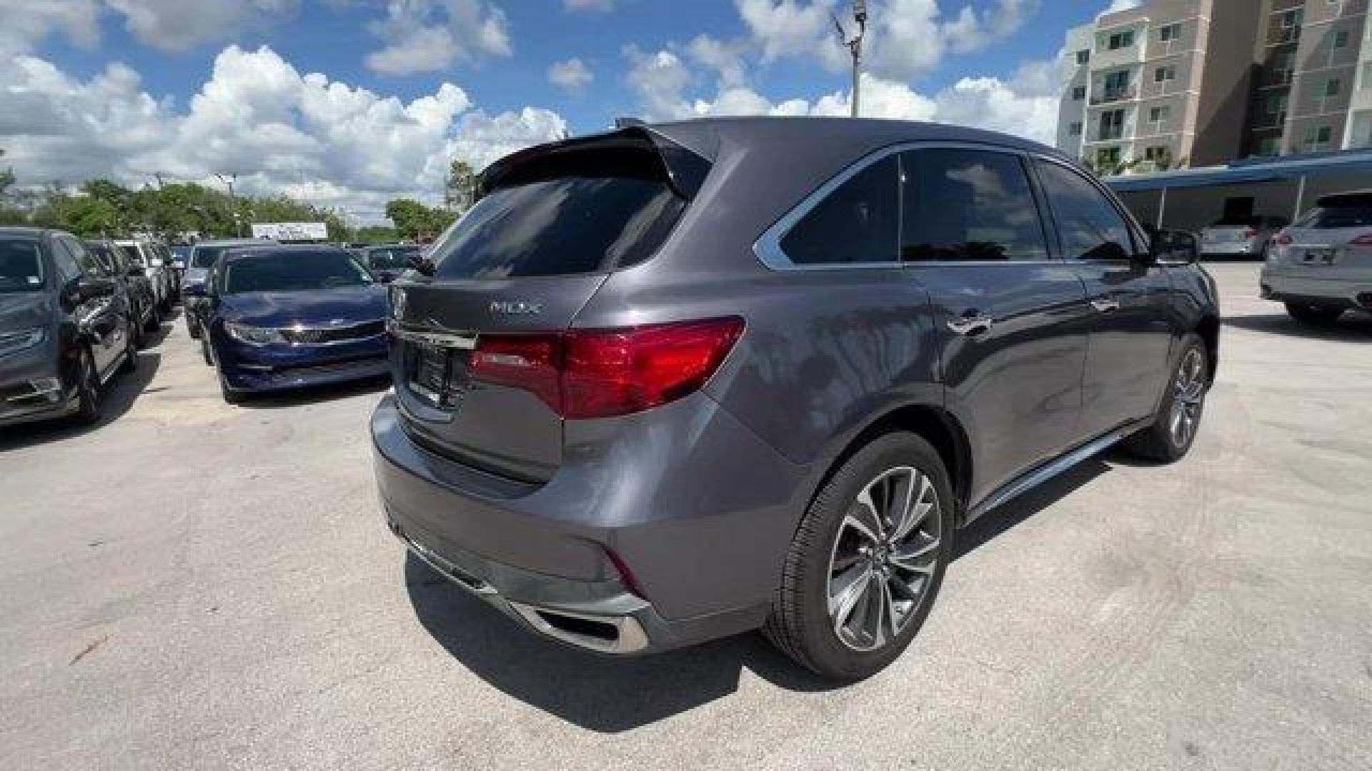 2020 Gray Acura MDX Technology (5J8YD3H52LL) with an 6 3.5 L engine, Automatic transmission, located at 27610 S Dixie Hwy, Homestead, FL, 33032, (305) 749-2348, 25.510241, -80.438301 - Only 23,617 Miles! Delivers 27 Highway MPG and 20 City MPG! This Acura MDX boasts a Premium Unleaded V-6 3.5 L/212 engine powering this Automatic transmission. Window Grid Antenna, Wheels: 20 x 8 Shark Gray Twisted 10-Spoke -inc: Machine-finished, Voice Activated Multi Zone Auto-Climate Control Air - Photo#3