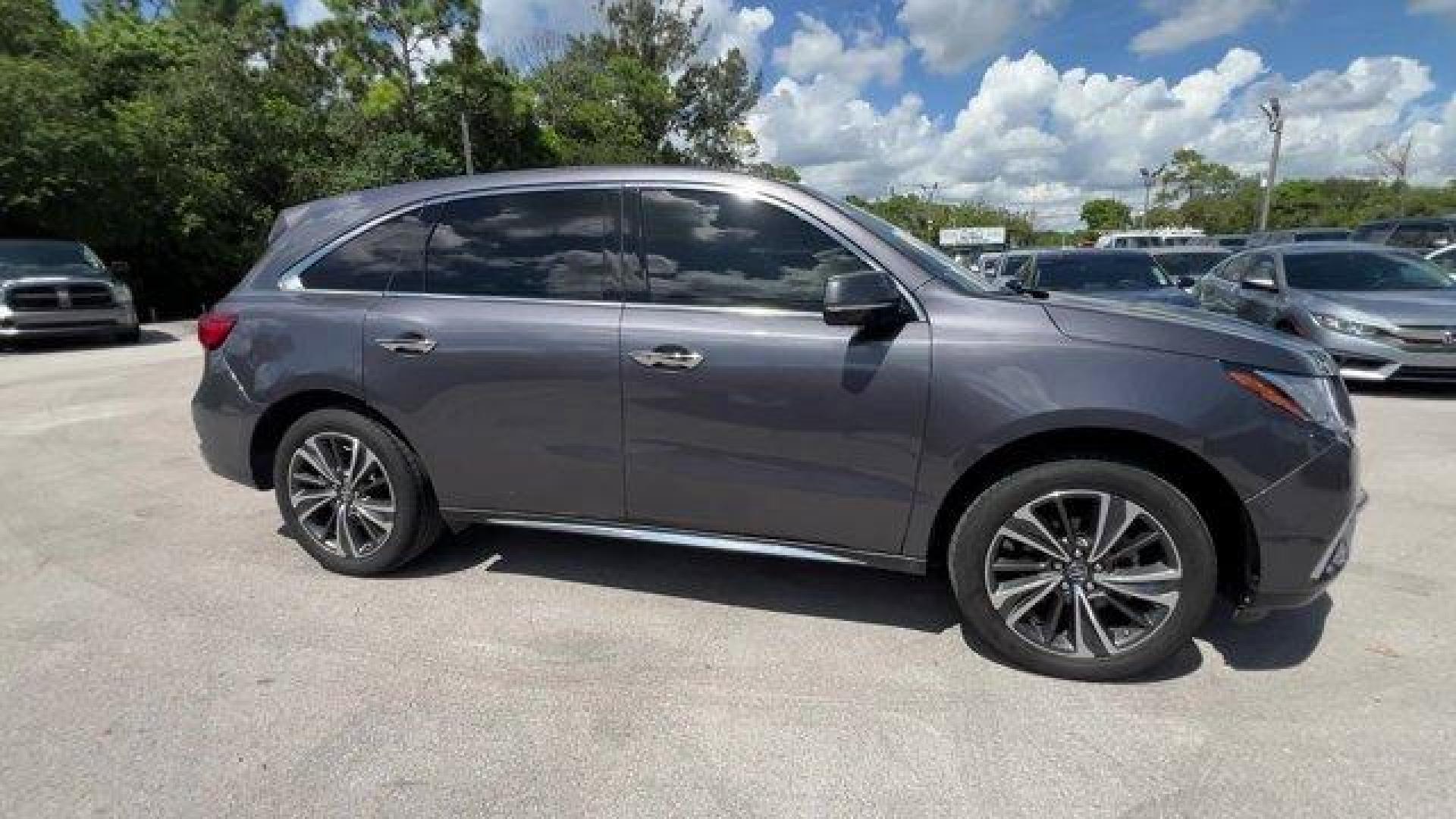 2020 Gray Acura MDX Technology (5J8YD3H52LL) with an 6 3.5 L engine, Automatic transmission, located at 27610 S Dixie Hwy, Homestead, FL, 33032, (305) 749-2348, 25.510241, -80.438301 - Only 23,617 Miles! Delivers 27 Highway MPG and 20 City MPG! This Acura MDX boasts a Premium Unleaded V-6 3.5 L/212 engine powering this Automatic transmission. Window Grid Antenna, Wheels: 20 x 8 Shark Gray Twisted 10-Spoke -inc: Machine-finished, Voice Activated Multi Zone Auto-Climate Control Air - Photo#4