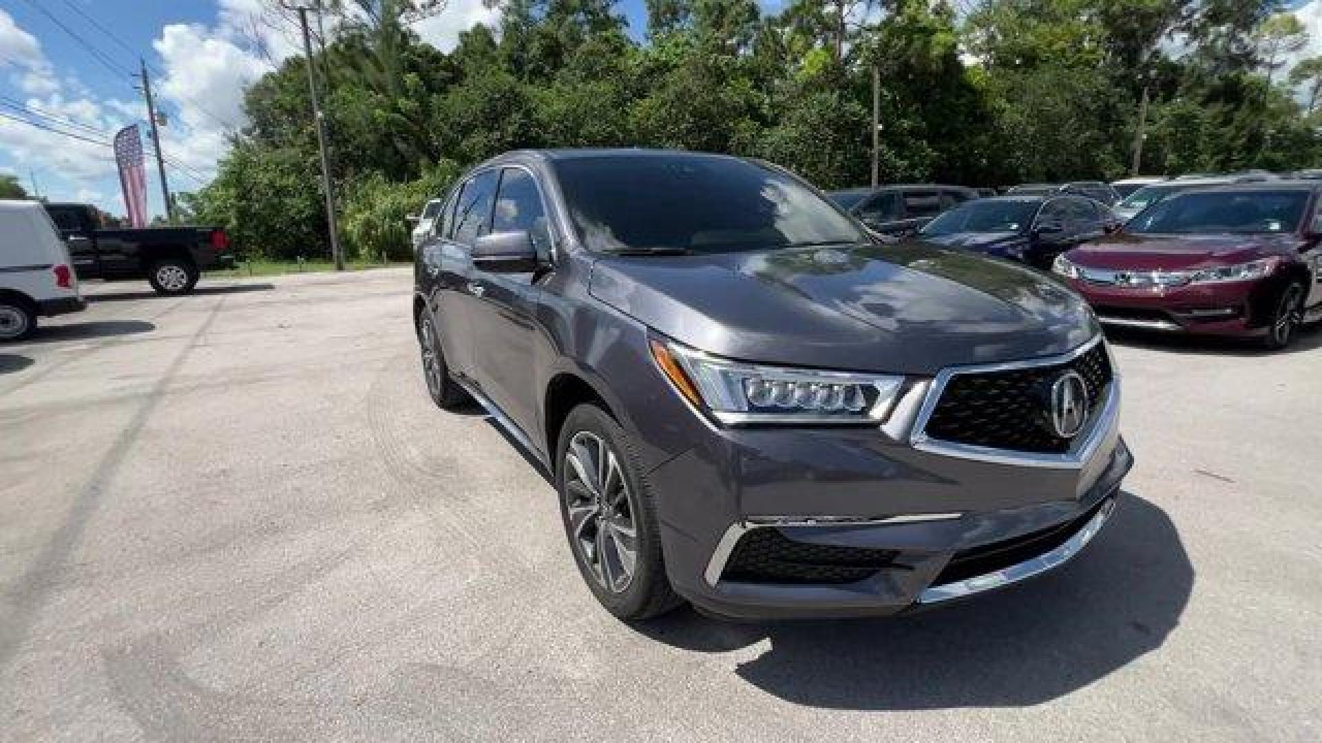 2020 Gray Acura MDX Technology (5J8YD3H52LL) with an 6 3.5 L engine, Automatic transmission, located at 27610 S Dixie Hwy, Homestead, FL, 33032, (305) 749-2348, 25.510241, -80.438301 - Only 23,617 Miles! Delivers 27 Highway MPG and 20 City MPG! This Acura MDX boasts a Premium Unleaded V-6 3.5 L/212 engine powering this Automatic transmission. Window Grid Antenna, Wheels: 20 x 8 Shark Gray Twisted 10-Spoke -inc: Machine-finished, Voice Activated Multi Zone Auto-Climate Control Air - Photo#5