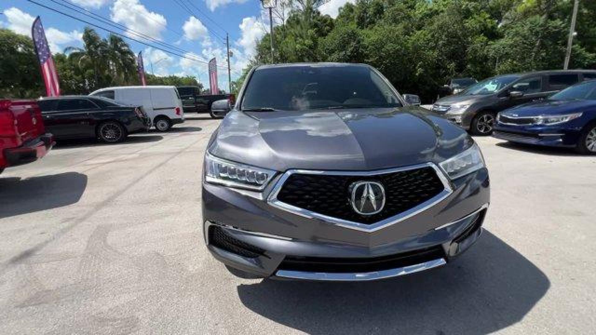 2020 Gray Acura MDX Technology (5J8YD3H52LL) with an 6 3.5 L engine, Automatic transmission, located at 27610 S Dixie Hwy, Homestead, FL, 33032, (305) 749-2348, 25.510241, -80.438301 - Only 23,617 Miles! Delivers 27 Highway MPG and 20 City MPG! This Acura MDX boasts a Premium Unleaded V-6 3.5 L/212 engine powering this Automatic transmission. Window Grid Antenna, Wheels: 20 x 8 Shark Gray Twisted 10-Spoke -inc: Machine-finished, Voice Activated Multi Zone Auto-Climate Control Air - Photo#6