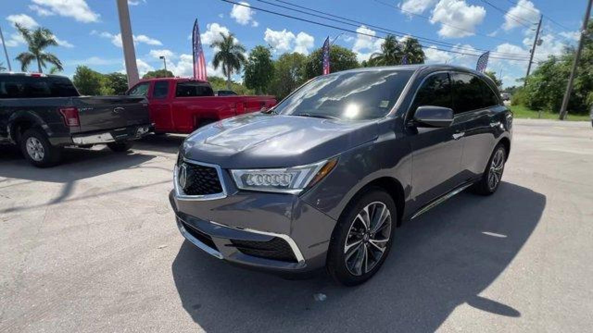 2020 Gray Acura MDX Technology (5J8YD3H52LL) with an 6 3.5 L engine, Automatic transmission, located at 27610 S Dixie Hwy, Homestead, FL, 33032, (305) 749-2348, 25.510241, -80.438301 - Only 23,617 Miles! Delivers 27 Highway MPG and 20 City MPG! This Acura MDX boasts a Premium Unleaded V-6 3.5 L/212 engine powering this Automatic transmission. Window Grid Antenna, Wheels: 20 x 8 Shark Gray Twisted 10-Spoke -inc: Machine-finished, Voice Activated Multi Zone Auto-Climate Control Air - Photo#7