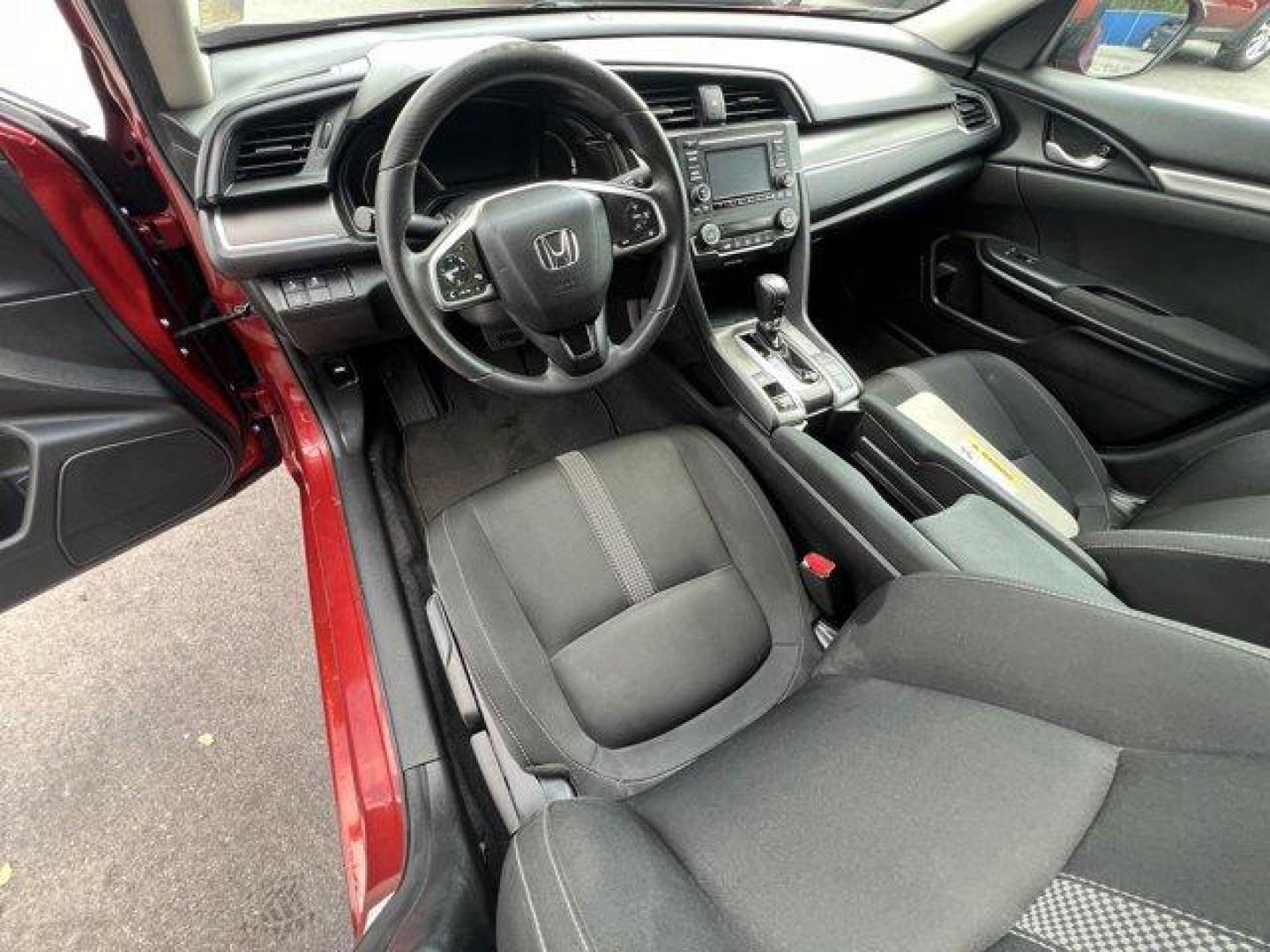 2021 Red Honda Civic Sedan LX (2HGFC2F6XMH) with an 4 2.0 L engine, Variable transmission, located at 27610 S Dixie Hwy, Homestead, FL, 33032, (305) 749-2348, 25.510241, -80.438301 - Only 25,847 Miles! Scores 38 Highway MPG and 30 City MPG! This Honda Civic Sedan boasts a Regular Unleaded I-4 2.0 L/122 engine powering this Variable transmission. Window Grid Antenna, Wheels: 16 w/Full Covers, Vehicle Stability Assist (VSA) Electronic Stability Control (ESC).*This Honda Civic Seda - Photo#11