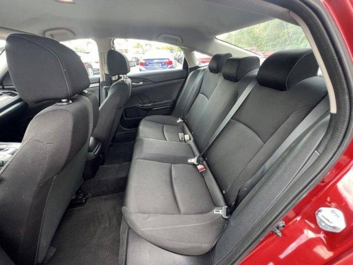 2021 Red Honda Civic Sedan LX (2HGFC2F6XMH) with an 4 2.0 L engine, Variable transmission, located at 27610 S Dixie Hwy, Homestead, FL, 33032, (305) 749-2348, 25.510241, -80.438301 - Only 25,847 Miles! Scores 38 Highway MPG and 30 City MPG! This Honda Civic Sedan boasts a Regular Unleaded I-4 2.0 L/122 engine powering this Variable transmission. Window Grid Antenna, Wheels: 16 w/Full Covers, Vehicle Stability Assist (VSA) Electronic Stability Control (ESC).*This Honda Civic Seda - Photo#13