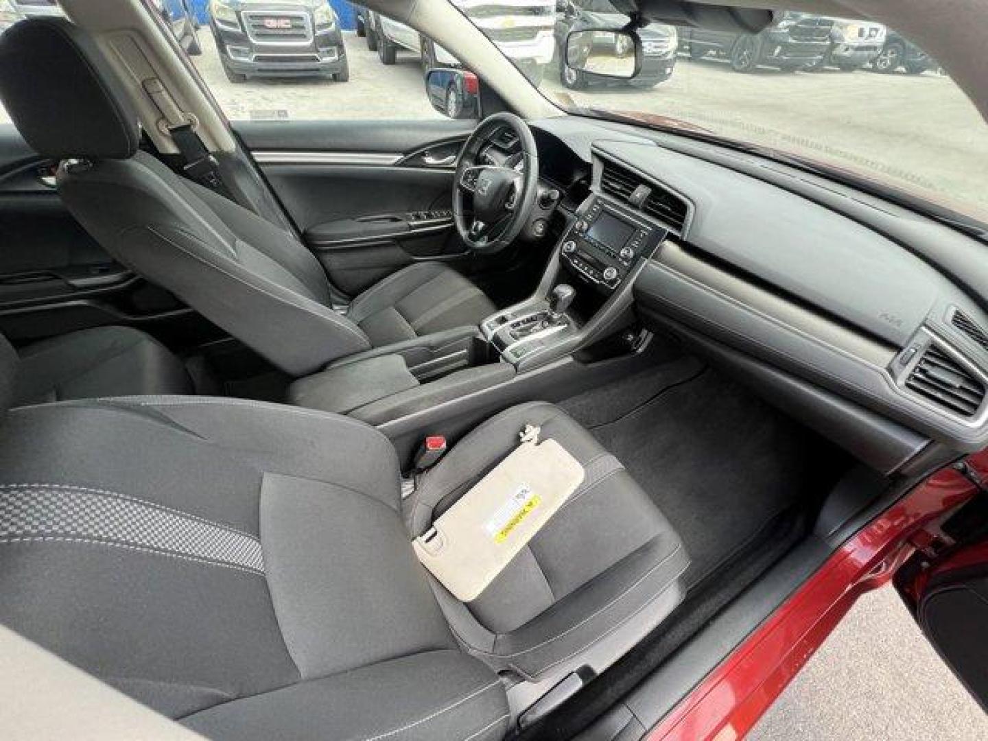 2021 Red Honda Civic Sedan LX (2HGFC2F6XMH) with an 4 2.0 L engine, Variable transmission, located at 27610 S Dixie Hwy, Homestead, FL, 33032, (305) 749-2348, 25.510241, -80.438301 - Only 25,847 Miles! Scores 38 Highway MPG and 30 City MPG! This Honda Civic Sedan boasts a Regular Unleaded I-4 2.0 L/122 engine powering this Variable transmission. Window Grid Antenna, Wheels: 16 w/Full Covers, Vehicle Stability Assist (VSA) Electronic Stability Control (ESC).*This Honda Civic Seda - Photo#16