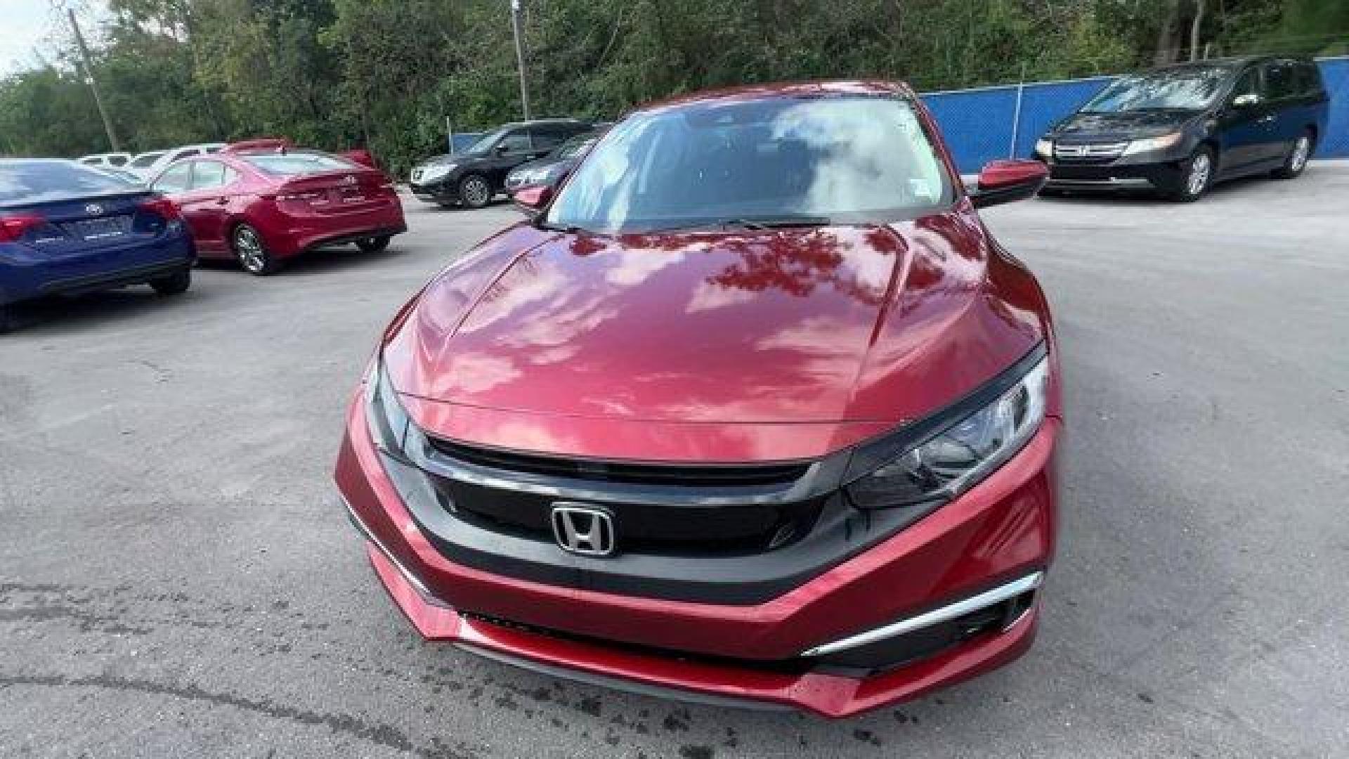 2021 Red Honda Civic Sedan LX (2HGFC2F6XMH) with an 4 2.0 L engine, Variable transmission, located at 27610 S Dixie Hwy, Homestead, FL, 33032, (305) 749-2348, 25.510241, -80.438301 - Only 25,847 Miles! Scores 38 Highway MPG and 30 City MPG! This Honda Civic Sedan boasts a Regular Unleaded I-4 2.0 L/122 engine powering this Variable transmission. Window Grid Antenna, Wheels: 16 w/Full Covers, Vehicle Stability Assist (VSA) Electronic Stability Control (ESC).*This Honda Civic Seda - Photo#7