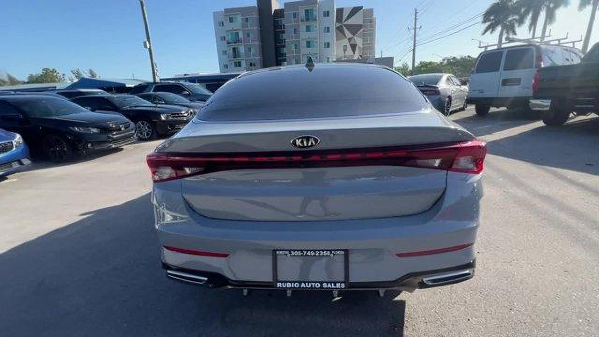 2021 Wolf Gray /Black Kia K5 GT-Line (5XXG64J24MG) with an 4 1.6 L engine, Automatic transmission, located at 27610 S Dixie Hwy, Homestead, FL, 33032, (305) 749-2348, 25.510241, -80.438301 - Only 35,083 Miles! Boasts 37 Highway MPG and 27 City MPG! This Kia K5 delivers a Intercooled Turbo Regular Unleaded I-4 1.6 L/98 engine powering this Automatic transmission. WOLF GRAY, GT-LINE RED INTERIOR PACKAGE, CARPETED FLOOR MATS.*This Kia K5 Comes Equipped with These Options *Window Grid Anten - Photo#3