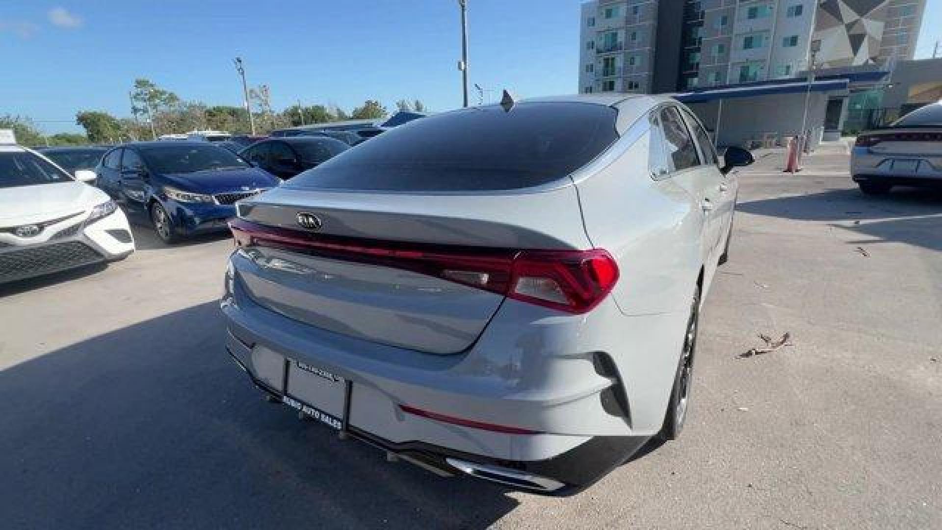 2021 Wolf Gray /Black Kia K5 GT-Line (5XXG64J24MG) with an 4 1.6 L engine, Automatic transmission, located at 27610 S Dixie Hwy, Homestead, FL, 33032, (305) 749-2348, 25.510241, -80.438301 - Only 35,083 Miles! Boasts 37 Highway MPG and 27 City MPG! This Kia K5 delivers a Intercooled Turbo Regular Unleaded I-4 1.6 L/98 engine powering this Automatic transmission. WOLF GRAY, GT-LINE RED INTERIOR PACKAGE, CARPETED FLOOR MATS.*This Kia K5 Comes Equipped with These Options *Window Grid Anten - Photo#4