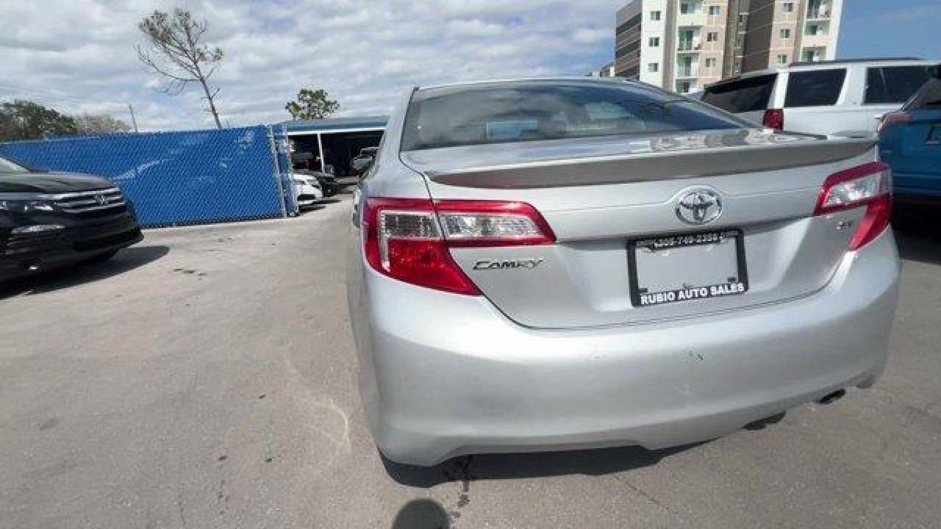2013 Silver Toyota Camry LE (4T1BF1FK8DU) with an 4 2.5L engine, Automatic transmission, located at 27610 S Dixie Hwy, Homestead, FL, 33032, (305) 749-2348, 25.510241, -80.438301 - KBB.com 10 Best New Sedans Under $25,000. Only 112,253 Miles! Boasts 35 Highway MPG and 25 City MPG! This Toyota Camry delivers a Gas I4 2.5L/152 engine powering this Automatic transmission. Whiplash-lessening front seats, Vehicle stability control, Variable assist pwr rack and pinion steering.* T - Photo#3