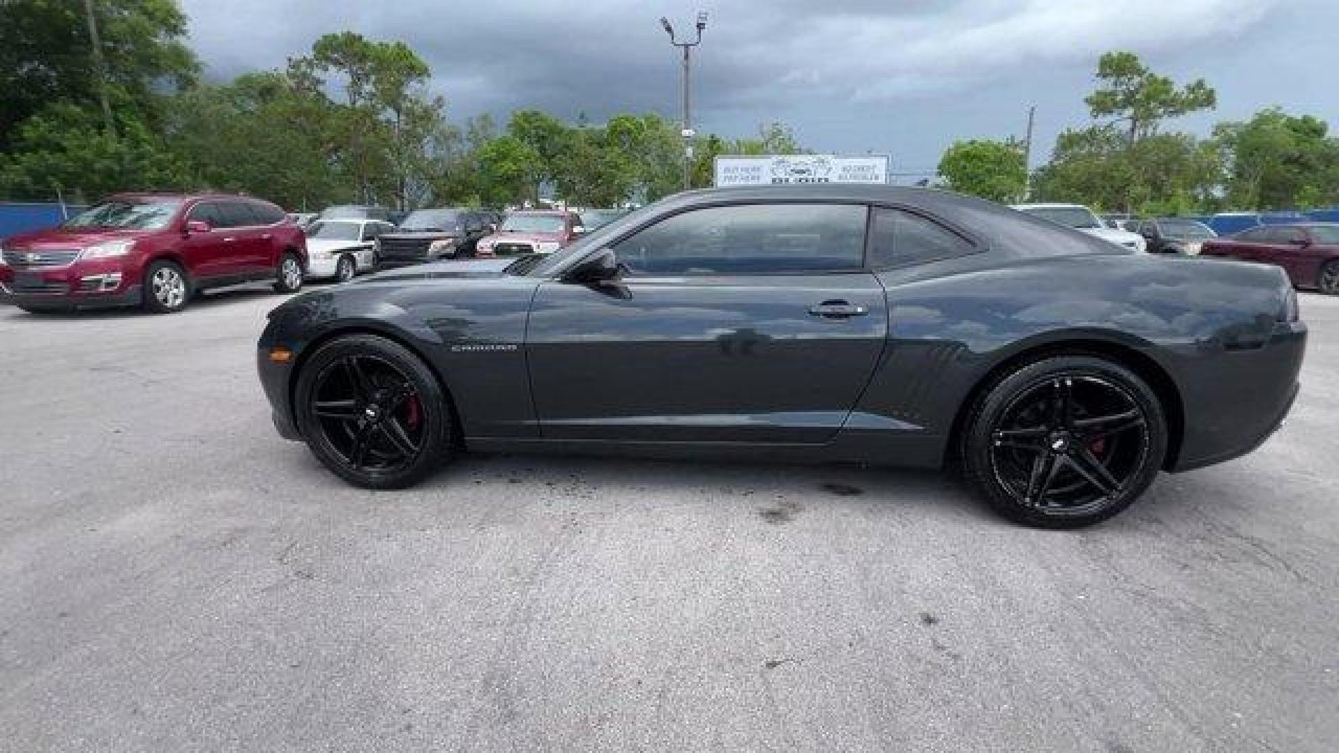 2014 Ashen Gray Metallic /Black Chevrolet Camaro 1LT (2G1FB1E31E9) with an 6 3.6L engine, Automatic transmission, located at 27610 S Dixie Hwy, Homestead, FL, 33032, (305) 749-2348, 25.510241, -80.438301 - KBB.com Best Resale Value Awards. Scores 27 Highway MPG and 18 City MPG! This Chevrolet Camaro delivers a Gas V6 3.6L/217 engine powering this Automatic transmission. WHEELS, 18 (45.7 CM) PAINTED ALUMINUM (STD), WHEEL AND TIRE, SPARE, COMPACT includes 18 (45.7 cm) steel spare wheel, TRANSMISSION, 6- - Photo#1