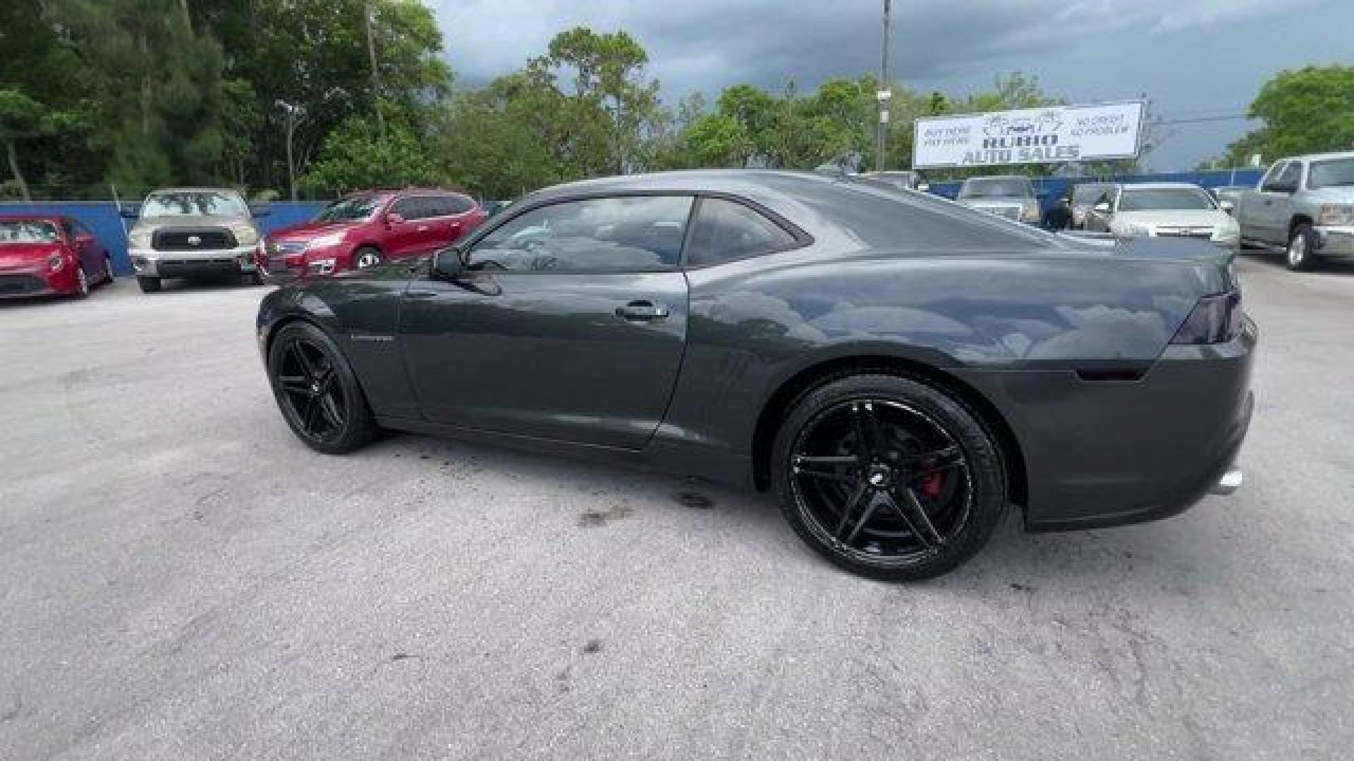 2014 Ashen Gray Metallic /Black Chevrolet Camaro 1LT (2G1FB1E31E9) with an 6 3.6L engine, Automatic transmission, located at 27610 S Dixie Hwy, Homestead, FL, 33032, (305) 749-2348, 25.510241, -80.438301 - KBB.com Best Resale Value Awards. Scores 27 Highway MPG and 18 City MPG! This Chevrolet Camaro delivers a Gas V6 3.6L/217 engine powering this Automatic transmission. WHEELS, 18 (45.7 CM) PAINTED ALUMINUM (STD), WHEEL AND TIRE, SPARE, COMPACT includes 18 (45.7 cm) steel spare wheel, TRANSMISSION, 6- - Photo#2