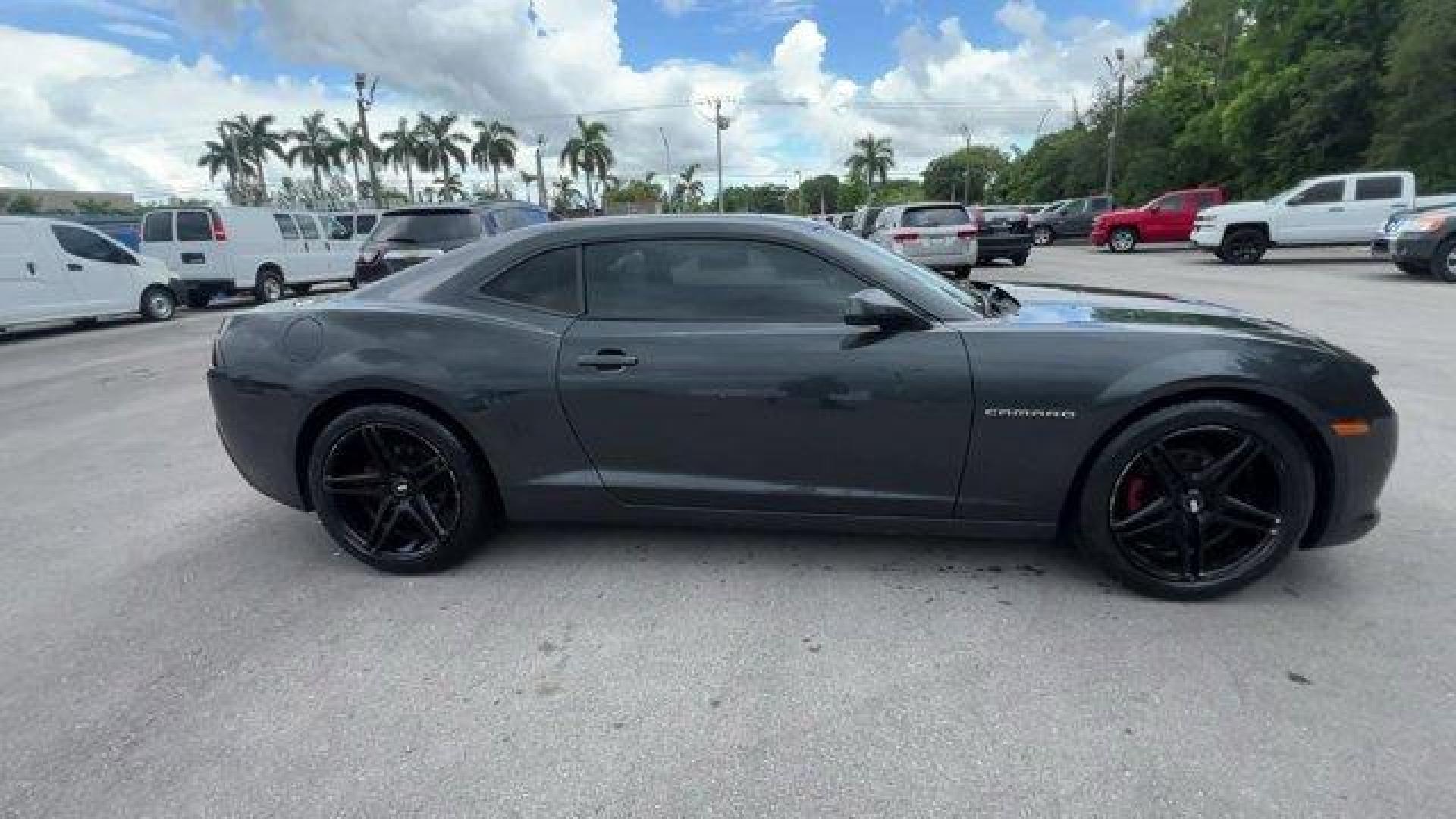 2014 Ashen Gray Metallic /Black Chevrolet Camaro 1LT (2G1FB1E31E9) with an 6 3.6L engine, Automatic transmission, located at 27610 S Dixie Hwy, Homestead, FL, 33032, (305) 749-2348, 25.510241, -80.438301 - KBB.com Best Resale Value Awards. Scores 27 Highway MPG and 18 City MPG! This Chevrolet Camaro delivers a Gas V6 3.6L/217 engine powering this Automatic transmission. WHEELS, 18 (45.7 CM) PAINTED ALUMINUM (STD), WHEEL AND TIRE, SPARE, COMPACT includes 18 (45.7 cm) steel spare wheel, TRANSMISSION, 6- - Photo#4