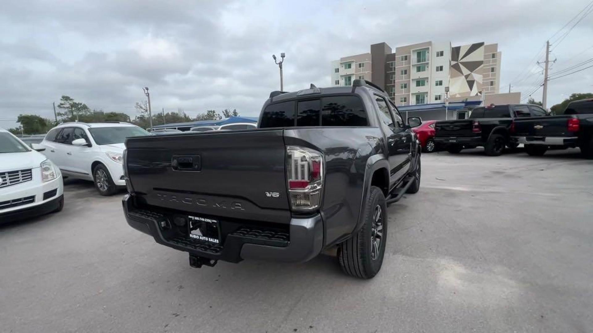 2016 Magnetic Gray Metallic /Black/Orange Toyota Tacoma SR5 (5TFAZ5CN4GX) with an V6 engine, Automatic transmission, located at 27610 S Dixie Hwy, Homestead, FL, 33032, (305) 749-2348, 25.510241, -80.438301 - Photo#4