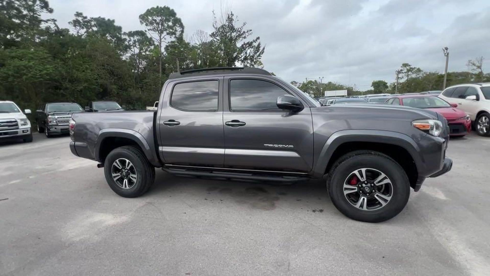 2016 Magnetic Gray Metallic /Black/Orange Toyota Tacoma SR5 (5TFAZ5CN4GX) with an V6 engine, Automatic transmission, located at 27610 S Dixie Hwy, Homestead, FL, 33032, (305) 749-2348, 25.510241, -80.438301 - Photo#5