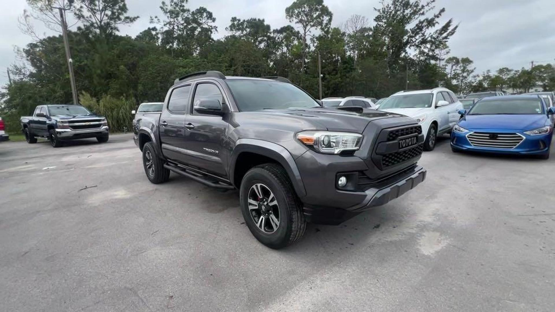 2016 Magnetic Gray Metallic /Black/Orange Toyota Tacoma SR5 (5TFAZ5CN4GX) with an V6 engine, Automatic transmission, located at 27610 S Dixie Hwy, Homestead, FL, 33032, (305) 749-2348, 25.510241, -80.438301 - Photo#6