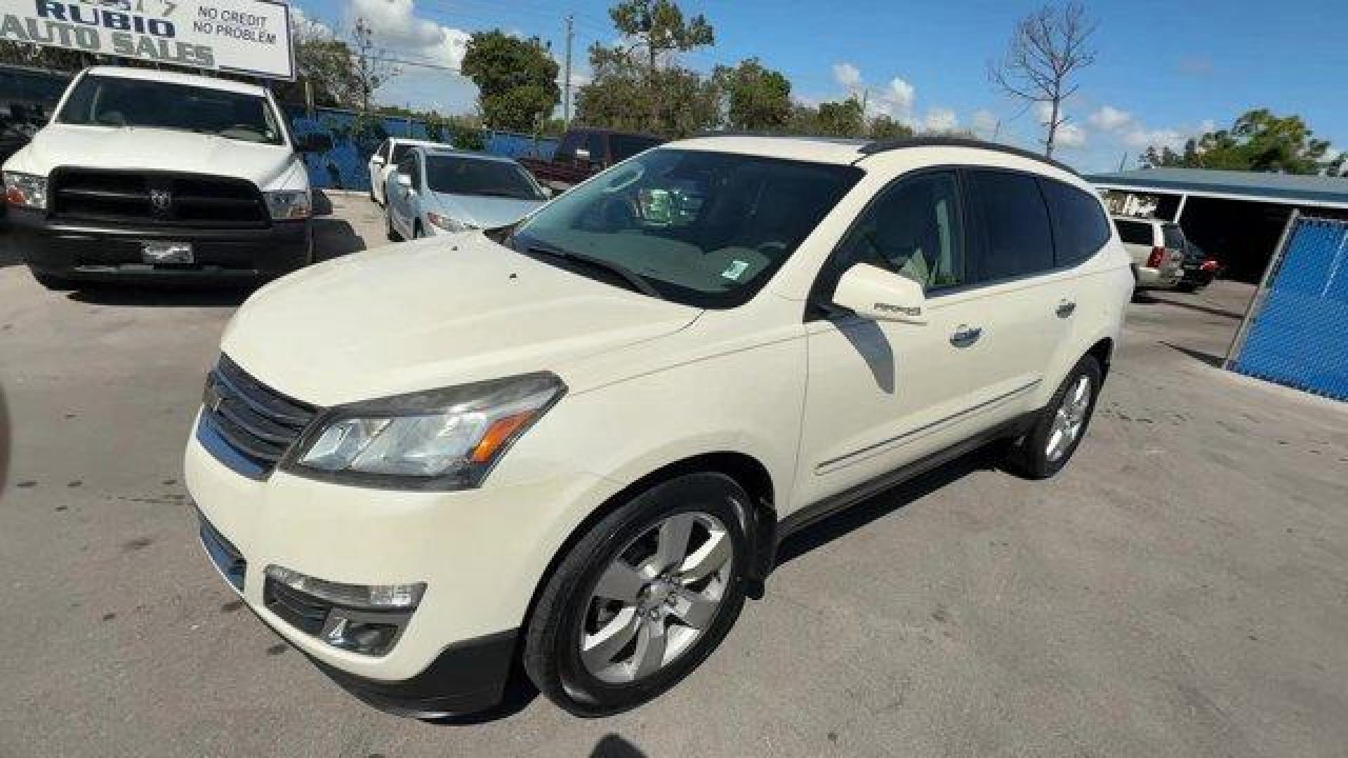 2015 White Diamond Tricoat /Dark Titanium/Light Titanium Chevrolet Traverse LTZ (1GNKRJKD7FJ) with an 6 3.6L engine, Automatic transmission, located at 27610 S Dixie Hwy, Homestead, FL, 33032, (305) 749-2348, 25.510241, -80.438301 - KBB.com Best Buy Awards Finalist. Only 93,388 Miles! Boasts 24 Highway MPG and 17 City MPG! This Chevrolet Traverse delivers a Gas V6 3.6L/217 engine powering this Automatic transmission. WHITE DIAMOND TRICOAT, TRANSMISSION, 6-SPEED AUTOMATIC (STD), TRAILERING EQUIPMENT includes (V08) heavy-duty coo - Photo#0