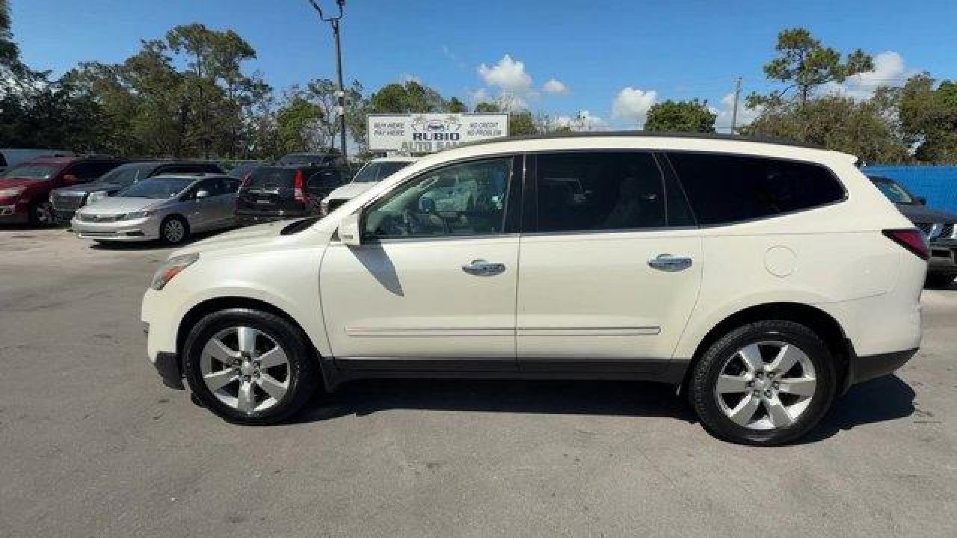 2015 White Diamond Tricoat /Dark Titanium/Light Titanium Chevrolet Traverse LTZ (1GNKRJKD7FJ) with an 6 3.6L engine, Automatic transmission, located at 27610 S Dixie Hwy, Homestead, FL, 33032, (305) 749-2348, 25.510241, -80.438301 - KBB.com Best Buy Awards Finalist. Only 93,388 Miles! Boasts 24 Highway MPG and 17 City MPG! This Chevrolet Traverse delivers a Gas V6 3.6L/217 engine powering this Automatic transmission. WHITE DIAMOND TRICOAT, TRANSMISSION, 6-SPEED AUTOMATIC (STD), TRAILERING EQUIPMENT includes (V08) heavy-duty coo - Photo#1