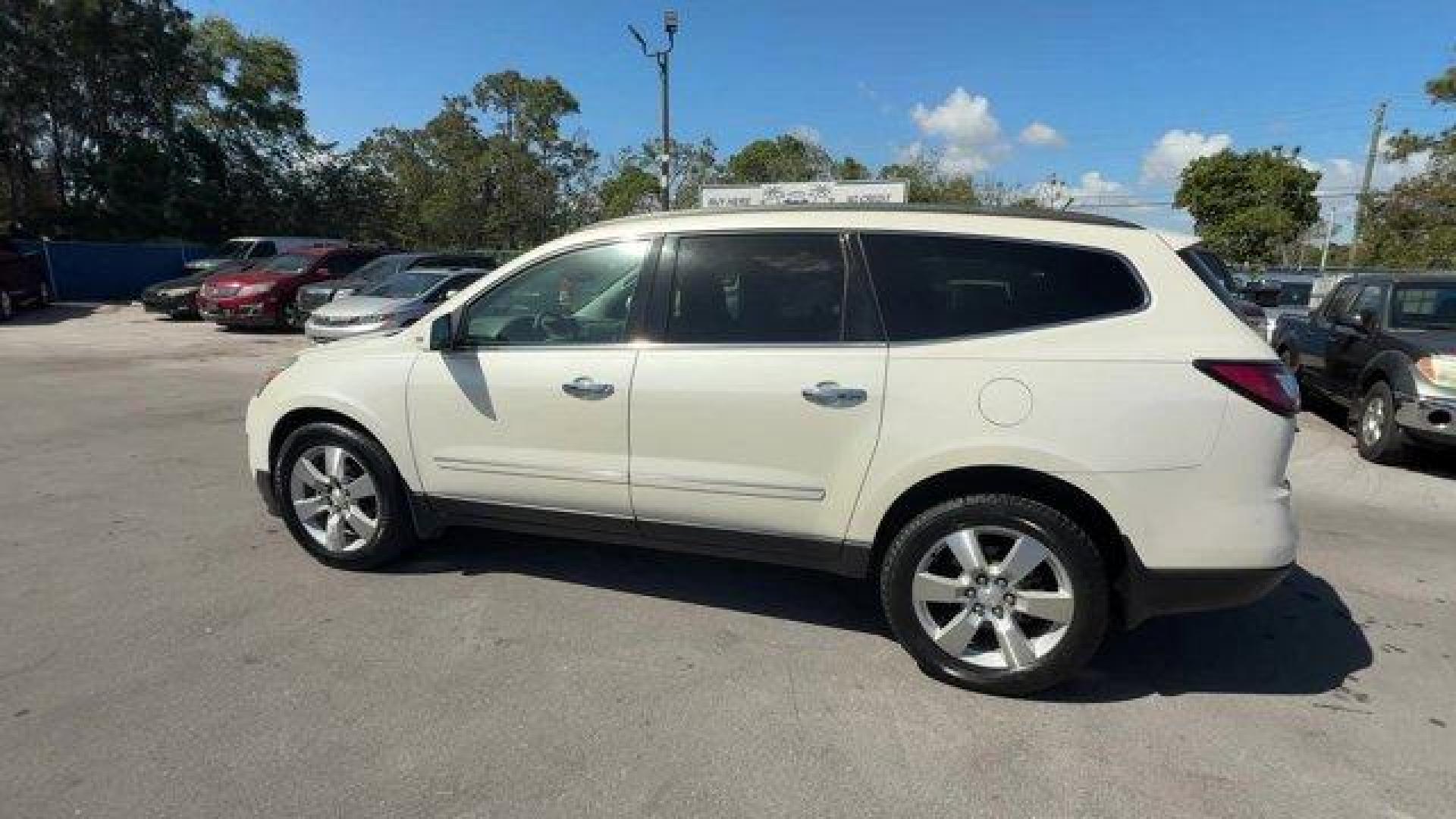 2015 White Diamond Tricoat /Dark Titanium/Light Titanium Chevrolet Traverse LTZ (1GNKRJKD7FJ) with an 6 3.6L engine, Automatic transmission, located at 27610 S Dixie Hwy, Homestead, FL, 33032, (305) 749-2348, 25.510241, -80.438301 - KBB.com Best Buy Awards Finalist. Only 93,388 Miles! Boasts 24 Highway MPG and 17 City MPG! This Chevrolet Traverse delivers a Gas V6 3.6L/217 engine powering this Automatic transmission. WHITE DIAMOND TRICOAT, TRANSMISSION, 6-SPEED AUTOMATIC (STD), TRAILERING EQUIPMENT includes (V08) heavy-duty coo - Photo#2