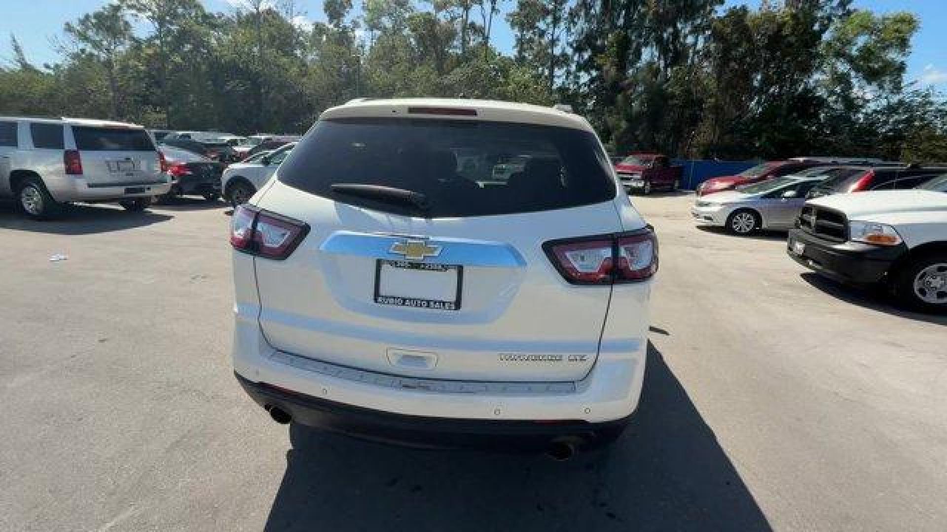 2015 White Diamond Tricoat /Dark Titanium/Light Titanium Chevrolet Traverse LTZ (1GNKRJKD7FJ) with an 6 3.6L engine, Automatic transmission, located at 27610 S Dixie Hwy, Homestead, FL, 33032, (305) 749-2348, 25.510241, -80.438301 - KBB.com Best Buy Awards Finalist. Only 93,388 Miles! Boasts 24 Highway MPG and 17 City MPG! This Chevrolet Traverse delivers a Gas V6 3.6L/217 engine powering this Automatic transmission. WHITE DIAMOND TRICOAT, TRANSMISSION, 6-SPEED AUTOMATIC (STD), TRAILERING EQUIPMENT includes (V08) heavy-duty coo - Photo#3