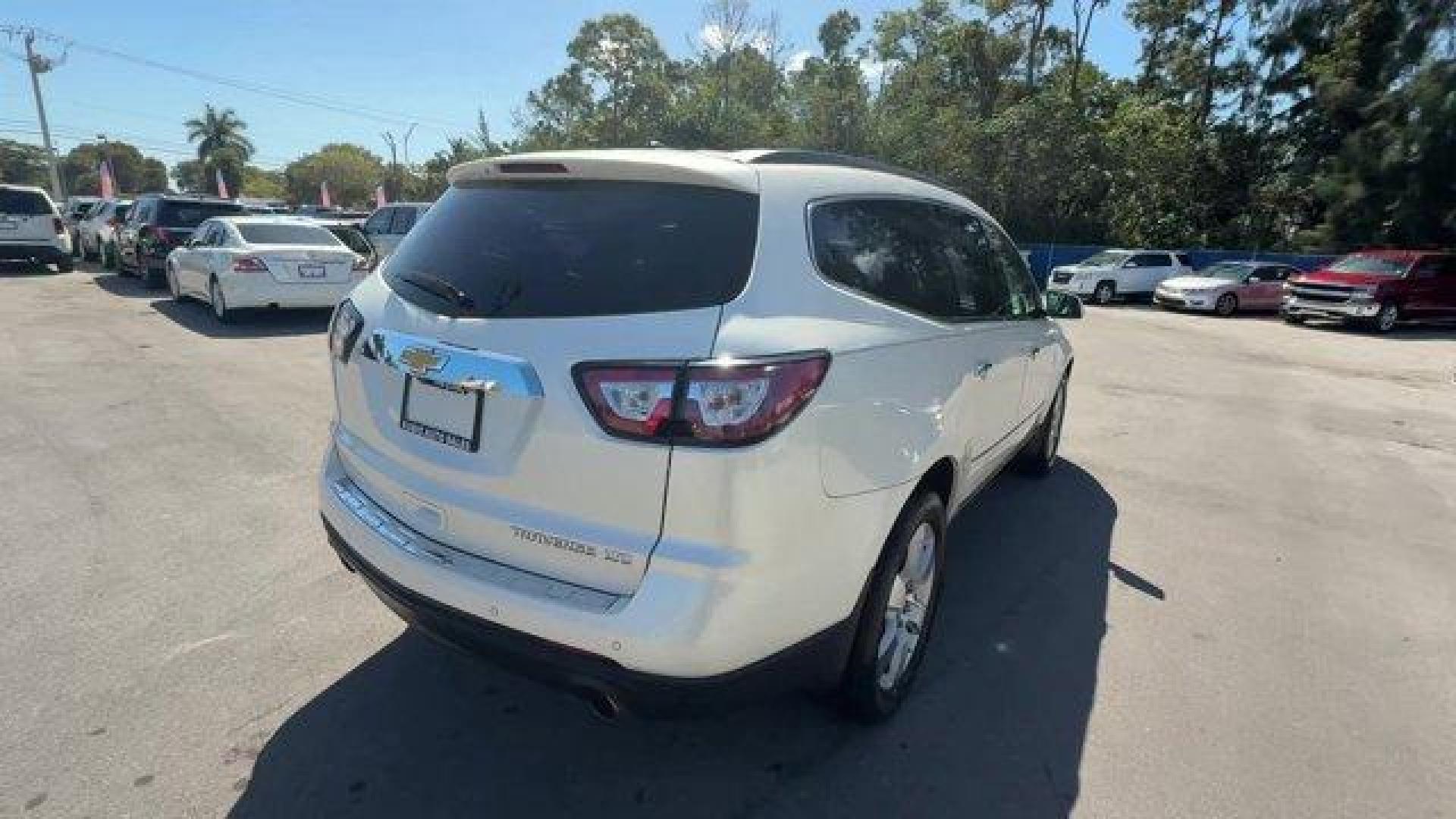 2015 White Diamond Tricoat /Dark Titanium/Light Titanium Chevrolet Traverse LTZ (1GNKRJKD7FJ) with an 6 3.6L engine, Automatic transmission, located at 27610 S Dixie Hwy, Homestead, FL, 33032, (305) 749-2348, 25.510241, -80.438301 - KBB.com Best Buy Awards Finalist. Only 93,388 Miles! Boasts 24 Highway MPG and 17 City MPG! This Chevrolet Traverse delivers a Gas V6 3.6L/217 engine powering this Automatic transmission. WHITE DIAMOND TRICOAT, TRANSMISSION, 6-SPEED AUTOMATIC (STD), TRAILERING EQUIPMENT includes (V08) heavy-duty coo - Photo#4