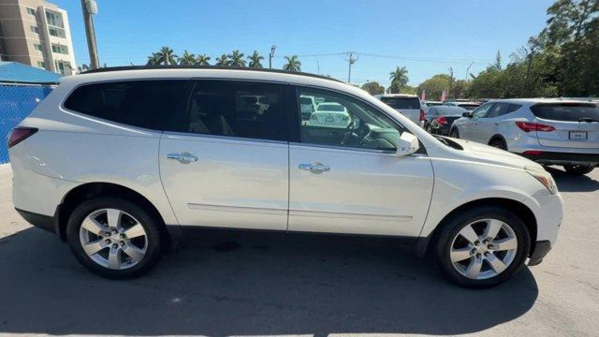 2015 White Diamond Tricoat /Dark Titanium/Light Titanium Chevrolet Traverse LTZ (1GNKRJKD7FJ) with an 6 3.6L engine, Automatic transmission, located at 27610 S Dixie Hwy, Homestead, FL, 33032, (305) 749-2348, 25.510241, -80.438301 - KBB.com Best Buy Awards Finalist. Only 93,388 Miles! Boasts 24 Highway MPG and 17 City MPG! This Chevrolet Traverse delivers a Gas V6 3.6L/217 engine powering this Automatic transmission. WHITE DIAMOND TRICOAT, TRANSMISSION, 6-SPEED AUTOMATIC (STD), TRAILERING EQUIPMENT includes (V08) heavy-duty coo - Photo#5