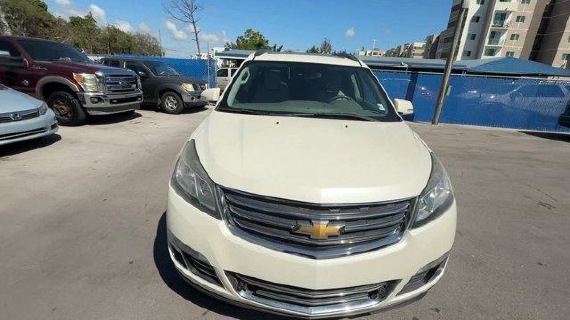 2015 White Diamond Tricoat /Dark Titanium/Light Titanium Chevrolet Traverse LTZ (1GNKRJKD7FJ) with an 6 3.6L engine, Automatic transmission, located at 27610 S Dixie Hwy, Homestead, FL, 33032, (305) 749-2348, 25.510241, -80.438301 - KBB.com Best Buy Awards Finalist. Only 93,388 Miles! Boasts 24 Highway MPG and 17 City MPG! This Chevrolet Traverse delivers a Gas V6 3.6L/217 engine powering this Automatic transmission. WHITE DIAMOND TRICOAT, TRANSMISSION, 6-SPEED AUTOMATIC (STD), TRAILERING EQUIPMENT includes (V08) heavy-duty coo - Photo#7