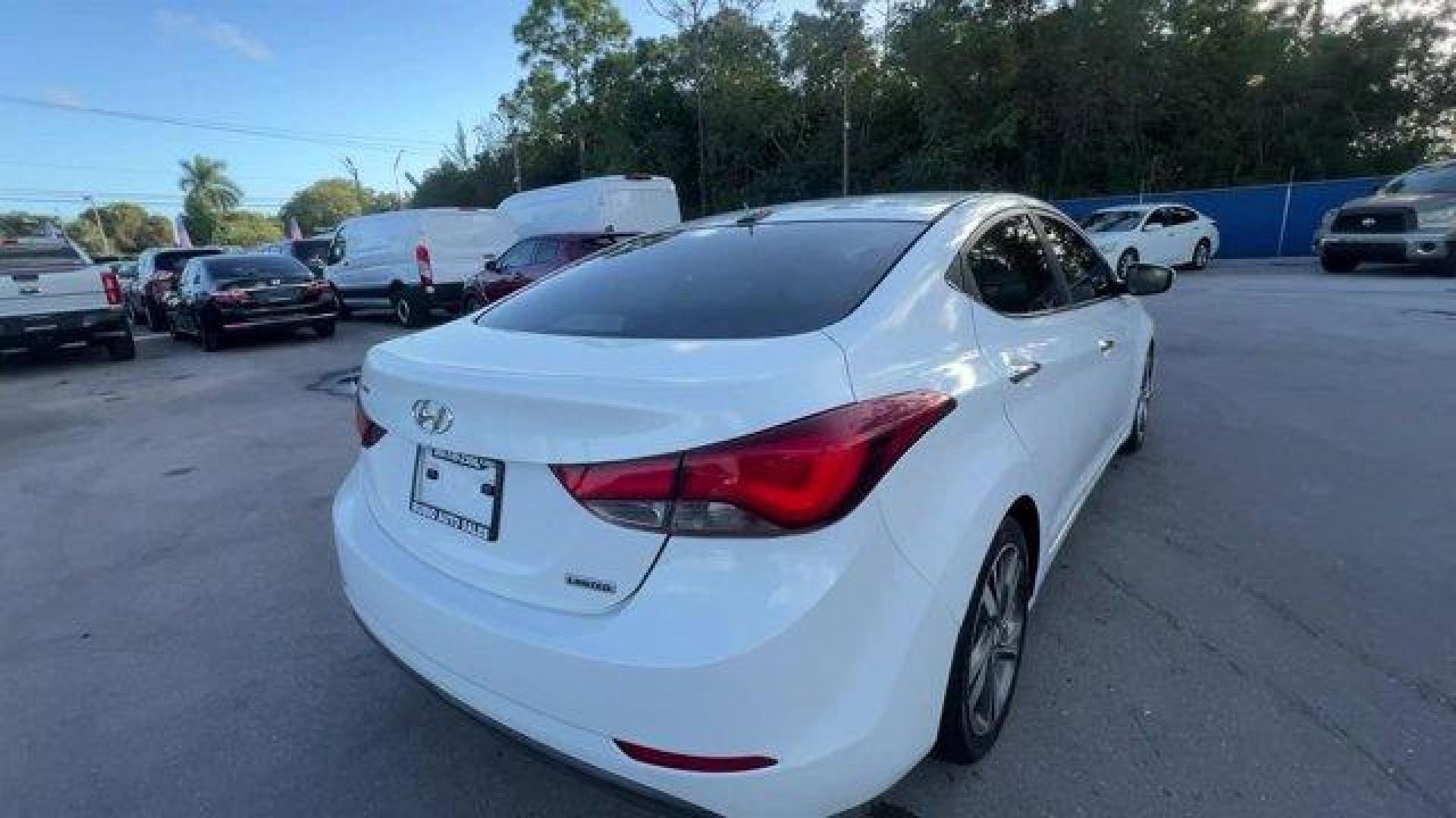 2015 Quartz White Pearl /Beige Hyundai Elantra Limited (5NPDH4AE2FH) with an 4 1.8 L engine, Automatic transmission, located at 27610 S Dixie Hwy, Homestead, FL, 33032, (305) 749-2348, 25.510241, -80.438301 - IIHS Top Safety Pick. Boasts 37 Highway MPG and 27 City MPG! This Hyundai Elantra boasts a Regular Unleaded I-4 1.8 L/110 engine powering this Automatic transmission. QUARTZ WHITE PEARL, CARPETED FLOOR MATS, BEIGE, LEATHER SEATING SURFACES.*This Hyundai Elantra Comes Equipped with These Options *Win - Photo#4