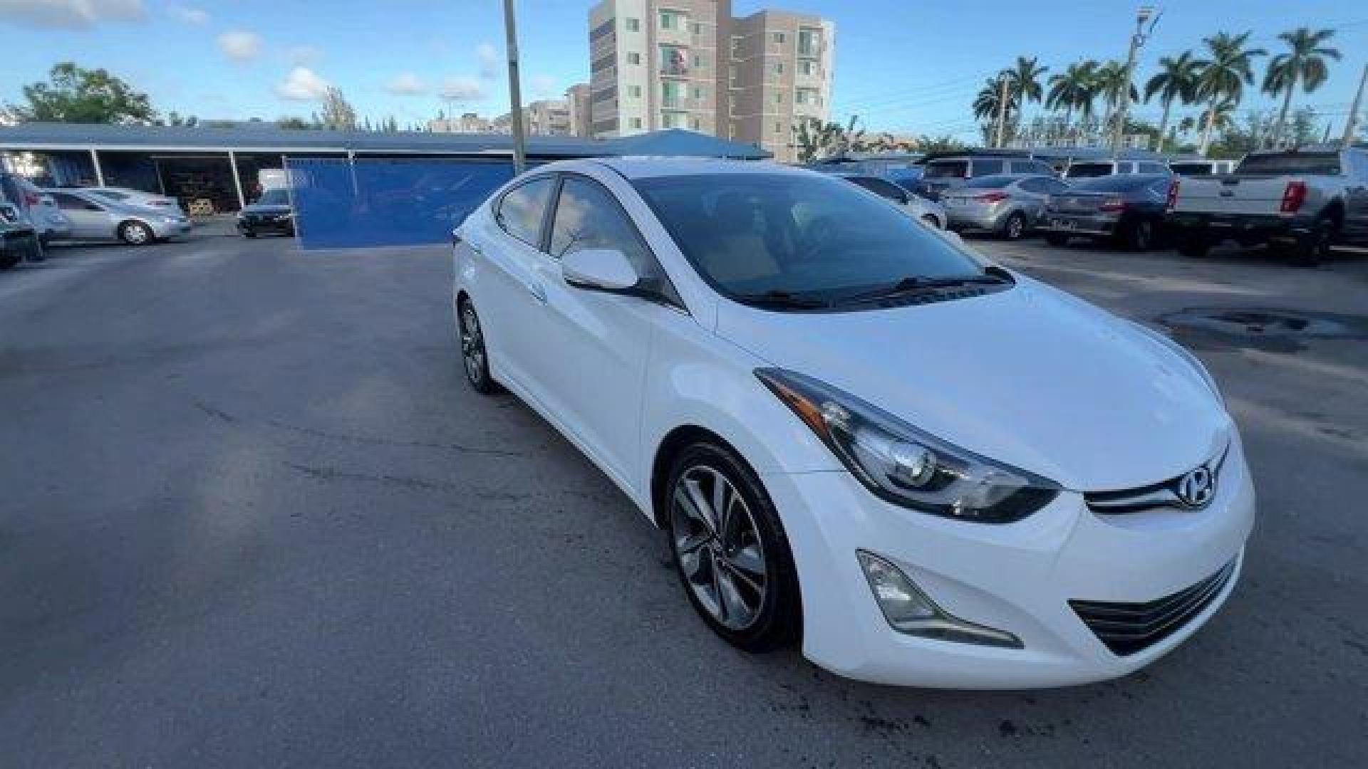 2015 Quartz White Pearl /Beige Hyundai Elantra Limited (5NPDH4AE2FH) with an 4 1.8 L engine, Automatic transmission, located at 27610 S Dixie Hwy, Homestead, FL, 33032, (305) 749-2348, 25.510241, -80.438301 - IIHS Top Safety Pick. Boasts 37 Highway MPG and 27 City MPG! This Hyundai Elantra boasts a Regular Unleaded I-4 1.8 L/110 engine powering this Automatic transmission. QUARTZ WHITE PEARL, CARPETED FLOOR MATS, BEIGE, LEATHER SEATING SURFACES.*This Hyundai Elantra Comes Equipped with These Options *Win - Photo#6